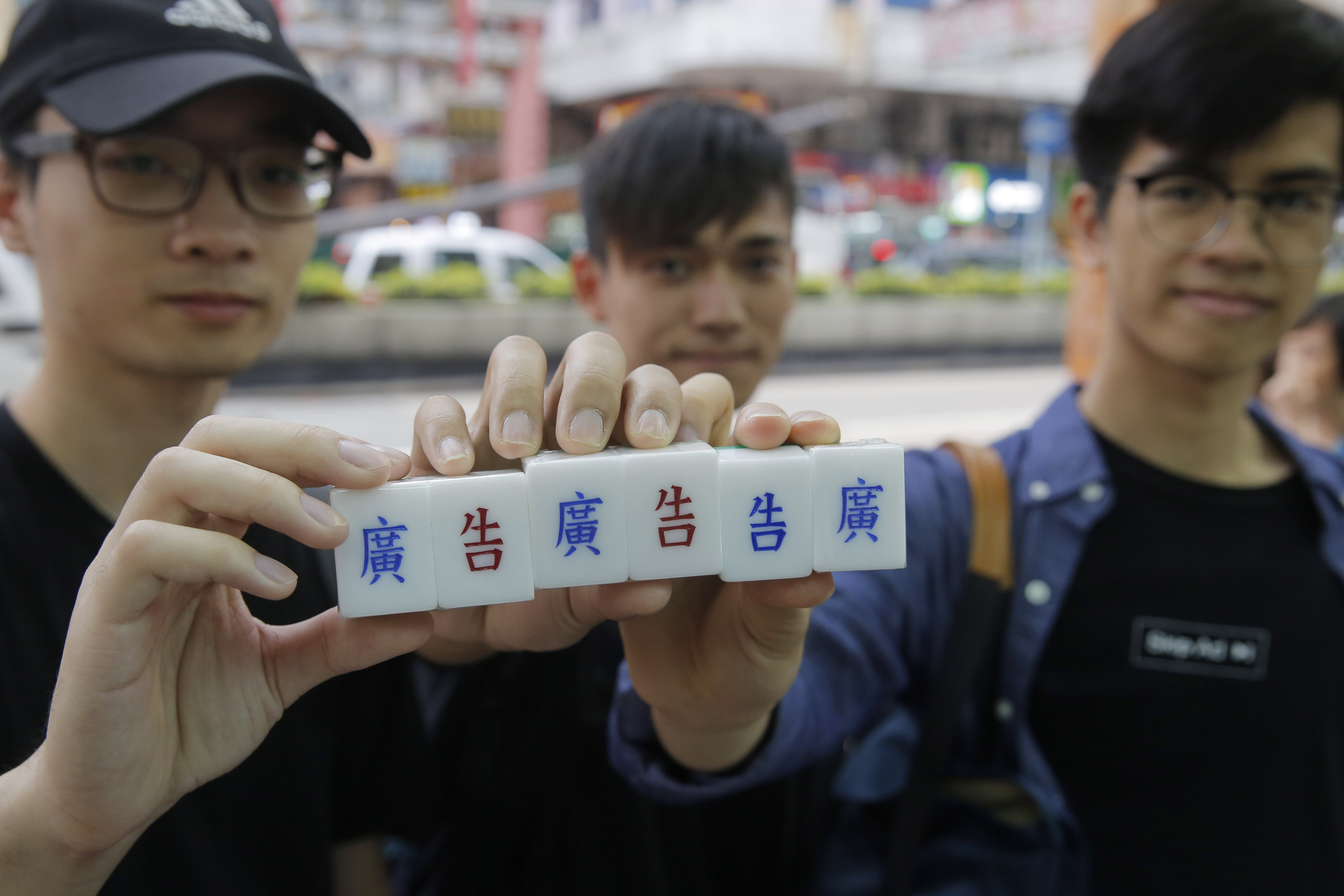 Artisan keeps his craft alive with each carved mahjong tile