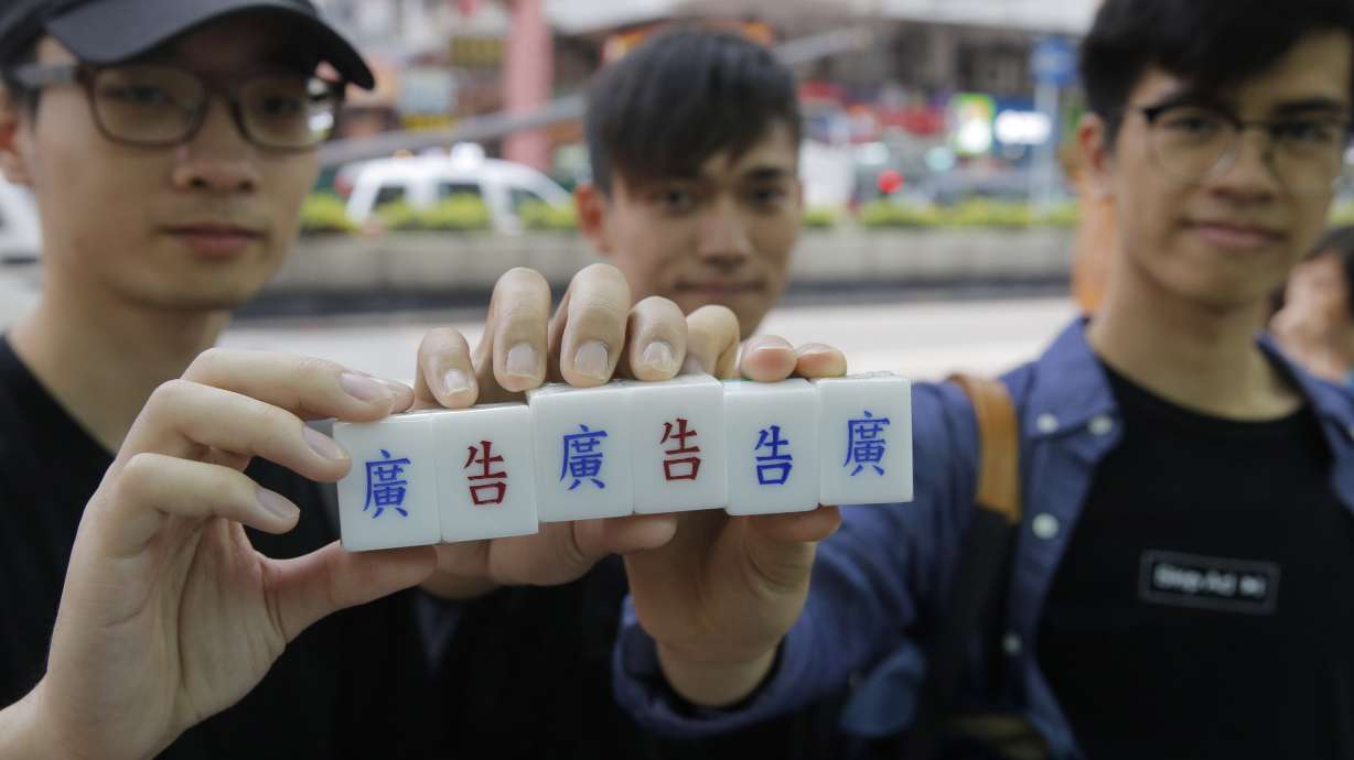 Artisan keeps his craft alive with each carved mahjong tile