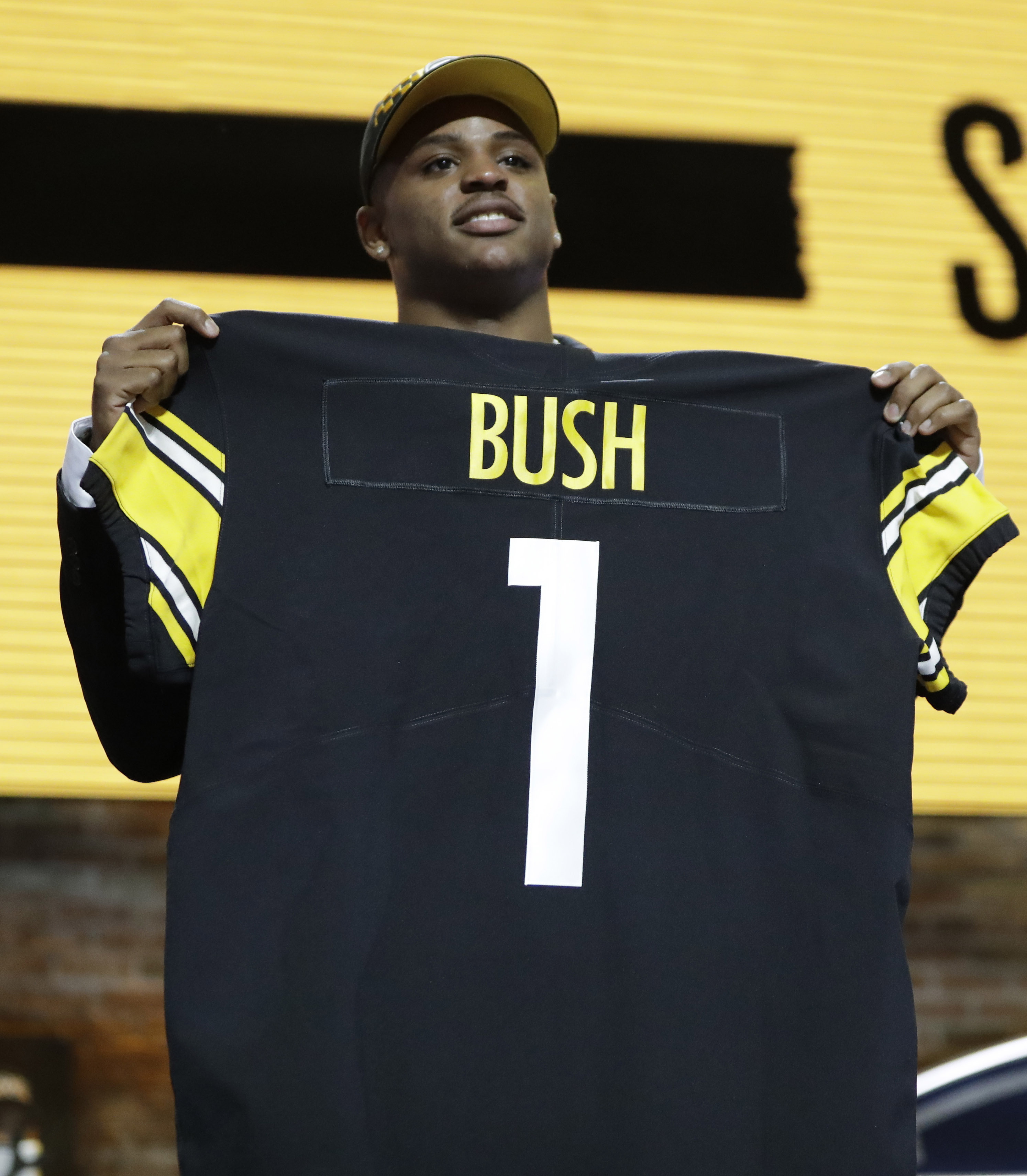Steelers trade up in first round to draft linebacker Bush