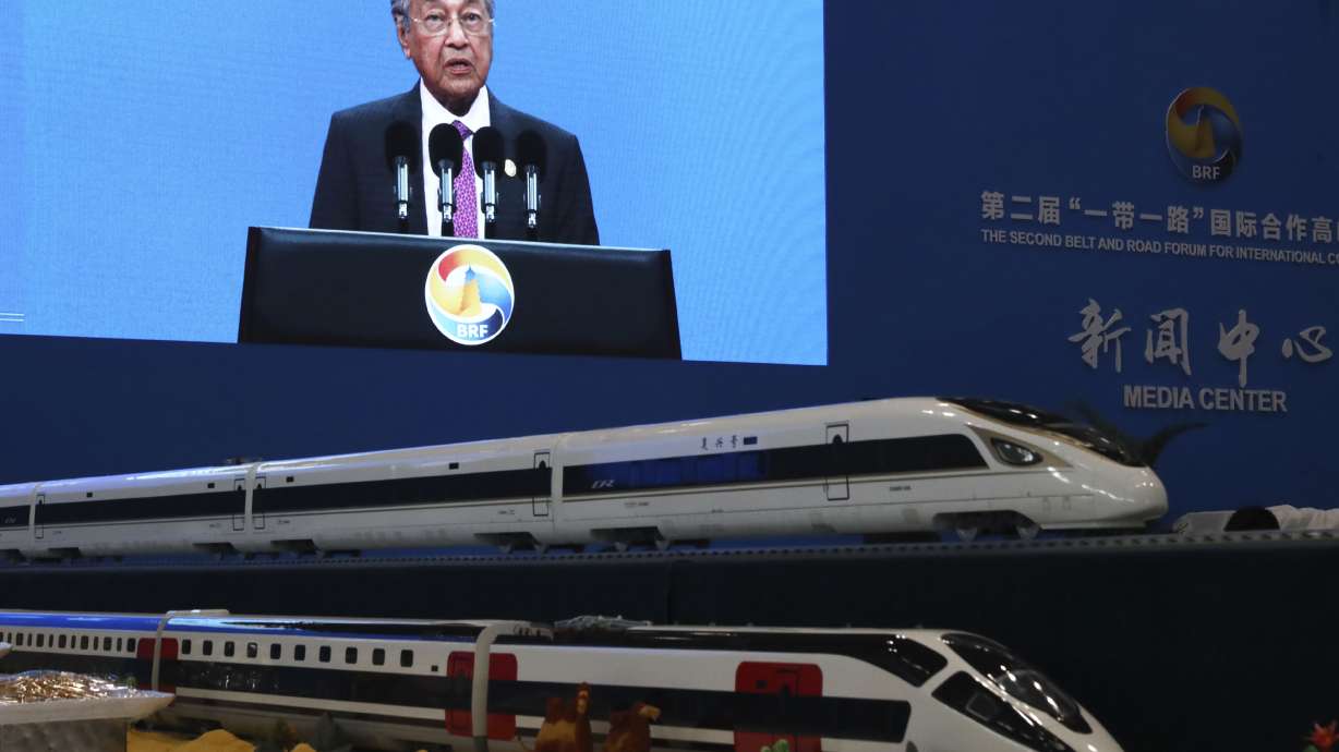 The Latest: Hammond says Britain a good Belt & Road partner