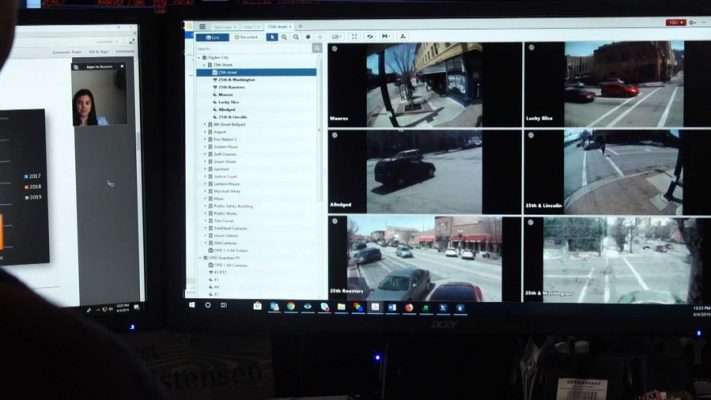 The "Real Time Crime Center" is a room full of TV monitors where analysts can pull up maps of crime, maps of probationers and parolees, and an extensive network of publicly and privately owned cameras. Photo: KSL TV
