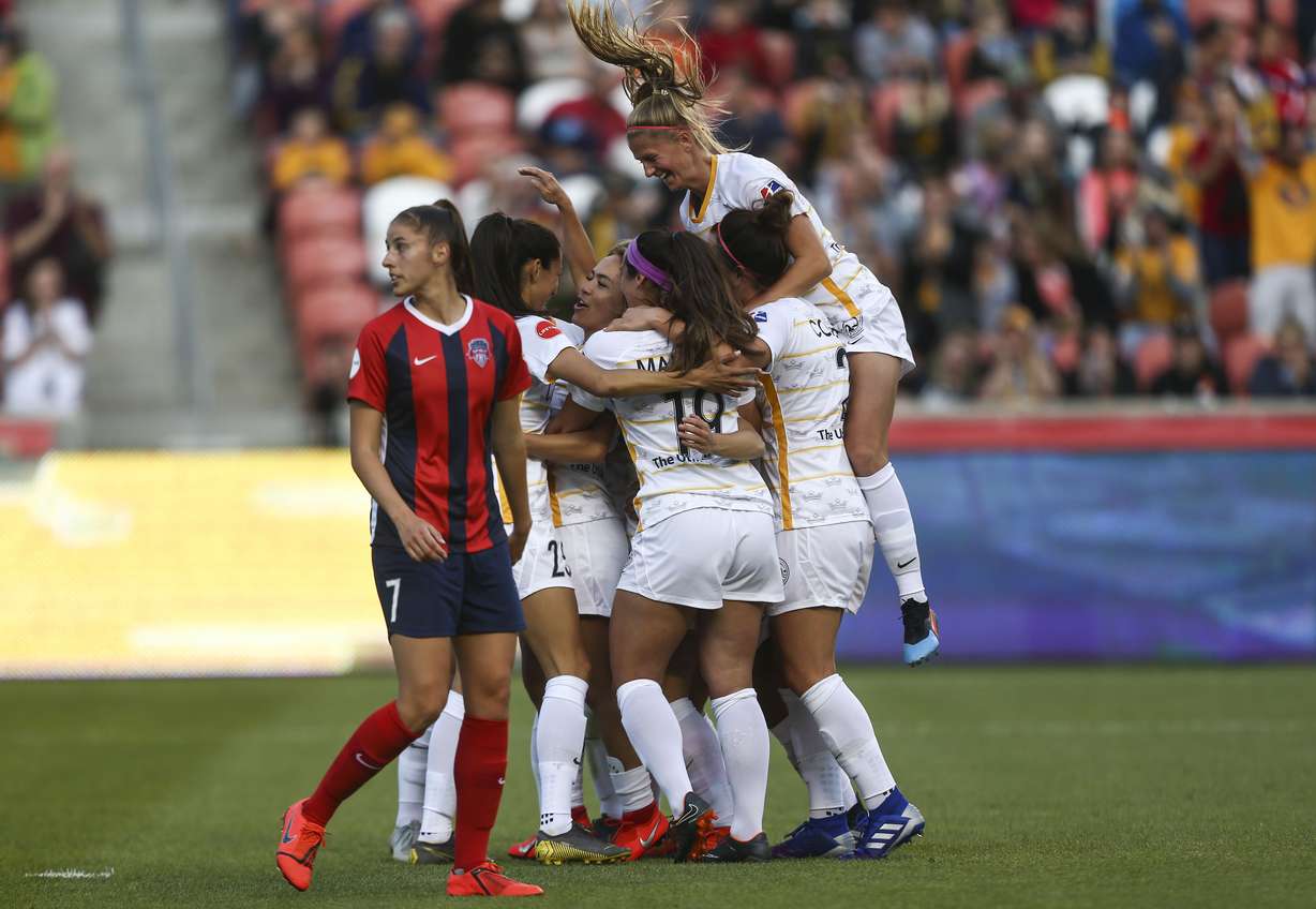 Utah Royals FC Lo'eau LaBonta is swarmed by teammates after she scored the game-winning goal against the Washington Spirit at Rio Tinto Stadium in Sandy on Saturday, April 20, 2019. (Photo: Silas Walker, KSL)