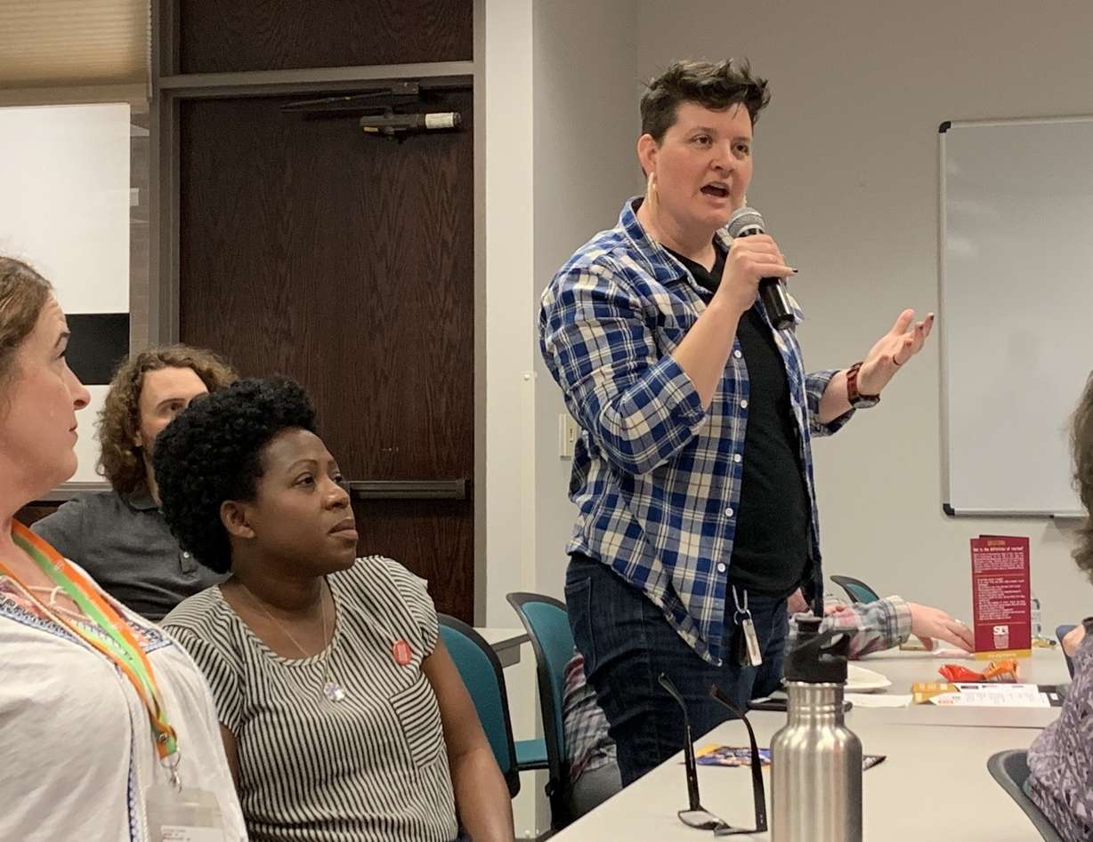 Maria Drummond, recreational therapist with Salt Lake County Youth Services, asks panelists a question during a Stand Against Racism — No Hate-No Fear panel discussion at the Salt Lake County Government Complex in Salt Lake City on Friday April 26, 2019. (Photo: Lauren Bennett, KSL)