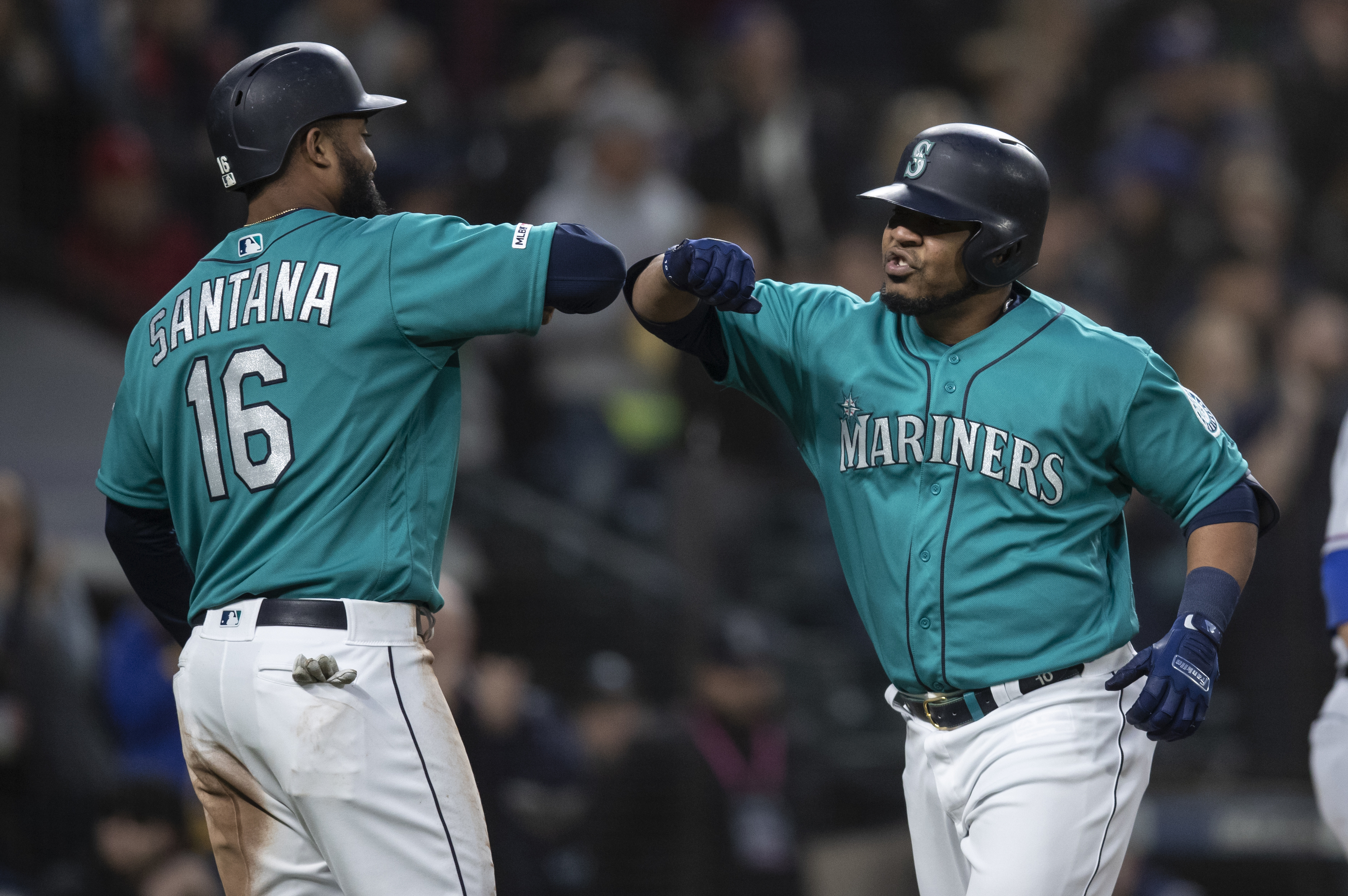 Encarnacion has 4 RBIs, Mariners beat Rangers 5-4 in 11