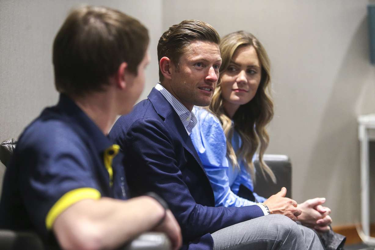 Alex Krambule, Gail Miller's grandson-in-law, discuss plans for charitable giving with grandson-in-law Jason Hawks and granddaughter Courtney Hawks in Sandy on Thursday, April 25, 2019. In 2016, Gail Miller launched an effort to get the generation whom she calls Miller 3.0 to become involved in the Larry H. & Gail Miller Family Foundation. (Photo: Scott G Winterton, KSL)