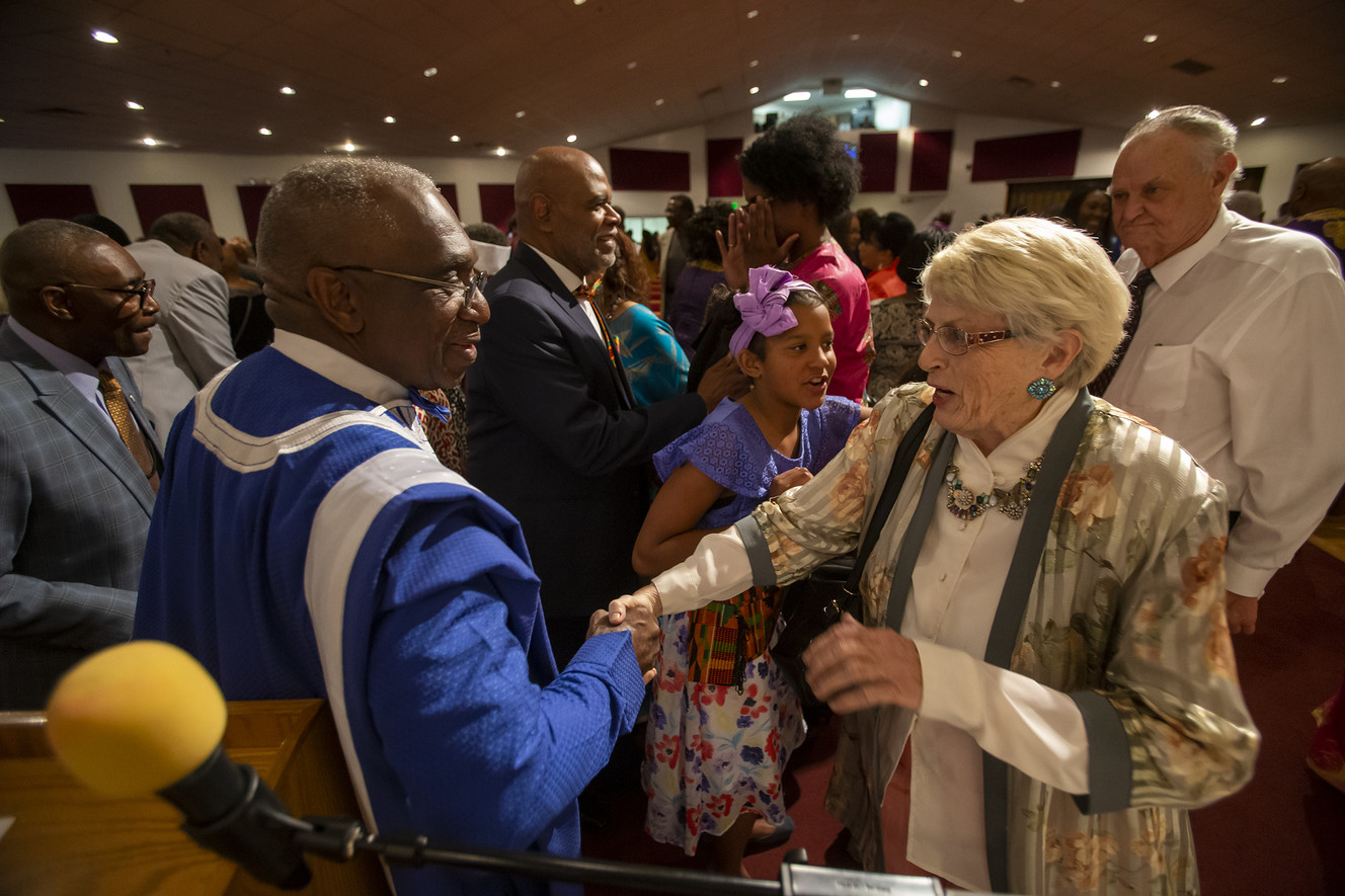 The Rev. France Davis shakes hands with Susan Rose, of Fill the Pot Ministry, at Calvary Baptist Church in Salt Lake City on Sunday, April 28, 2019. After 45 years, the Rev. Davis will retire as pastor of Calvary Baptist Church at the end of the year. (Photo: Scott G Winterton, KSL)