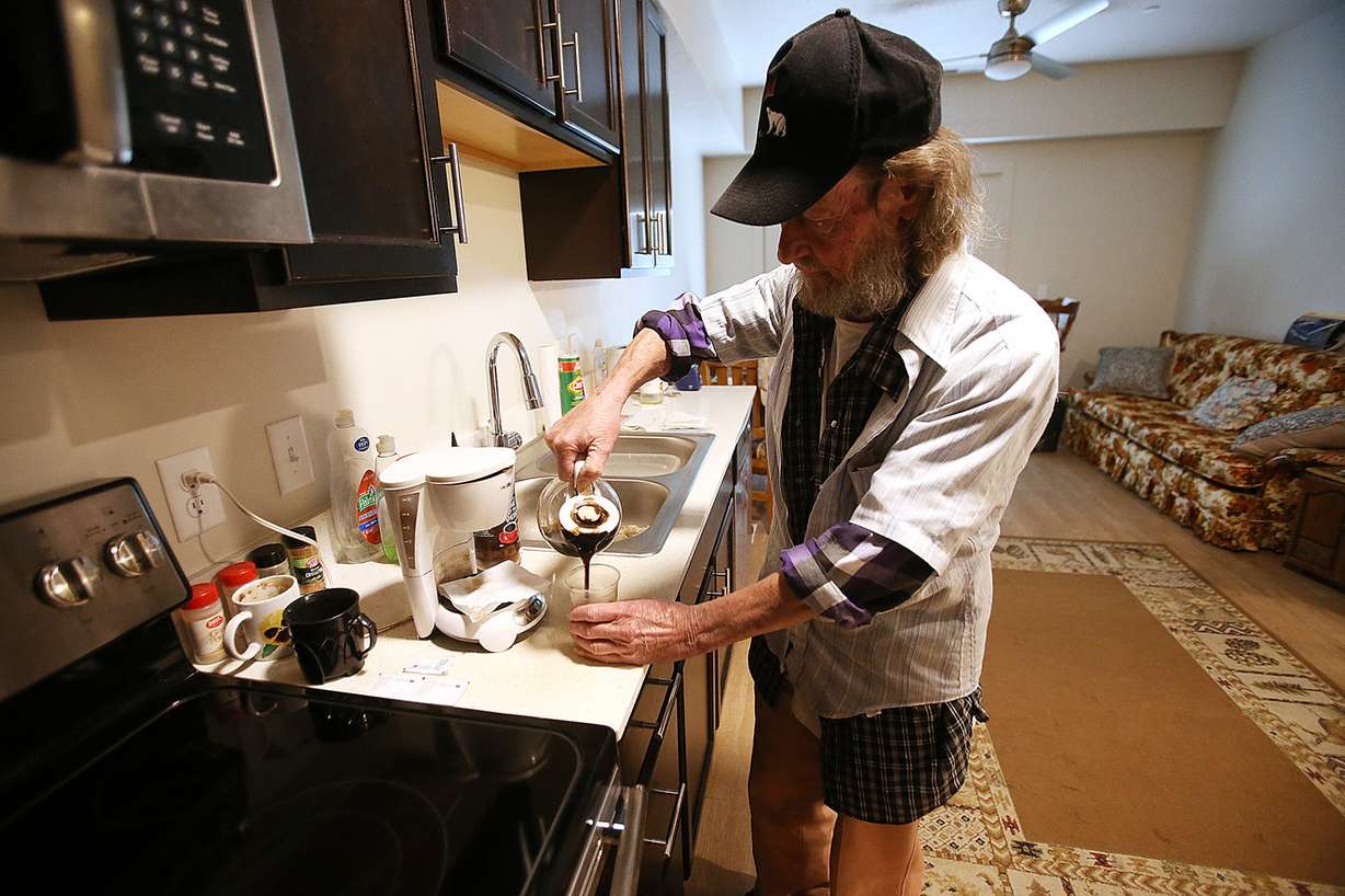 Rick Dornik pours a cup of coffee inside his apartment at Sharon Gardens Apartments in South Salt Lake on Monday, April 29, 2019, after Lt. Gov. Spencer Cox announced an initiative to get 100 once-homeless people into housing as part of the transition from closing the Road Home shelter in downtown Salt Lake City and the opening of three new, smaller homeless resource centers. (Photo: Scott G Winterton, KSL)