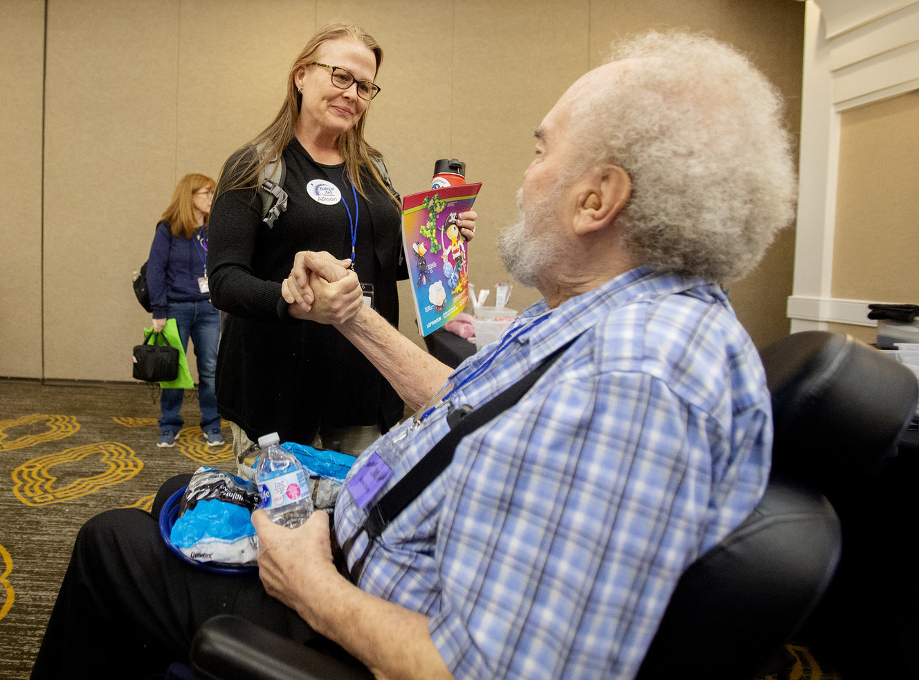 Balloon artist Marvin Hardy talks with Alison Dunning at the Airport Doubletree Hotel by Hilton on Monday. Both Marvin and his wife Penny Hardy are suffering from health troubles — Penny has stage 4 cancer that is in remission, and Marvin suffers complications from Agent Orange exposure during the Vietnam War — and fellow balloon artists are gathering for a "Balloon Jam" in Salt Lake City to honor them. (Photo: Scott G Winterton, KSL)