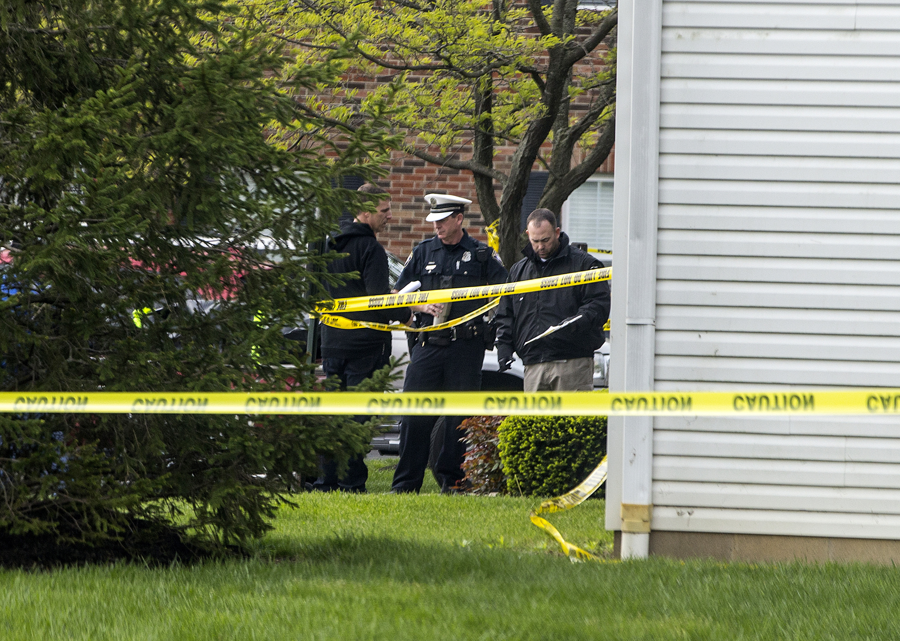 The Latest: Coroner identifies 4 killed in Ohio home