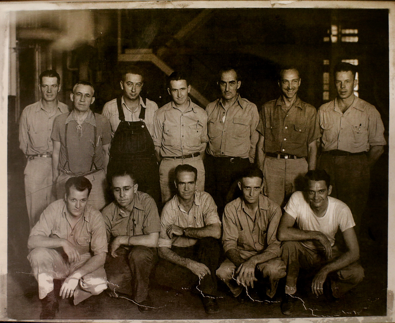 A photo of employees from the 1940s hangs in the control room at the Utah Power Plant in Magna on Wednesday, May 1, 2019. ARio Tinto Kennecott announced Wednesday the plant is being retired. (Photo: Laura Seitz, KSL)