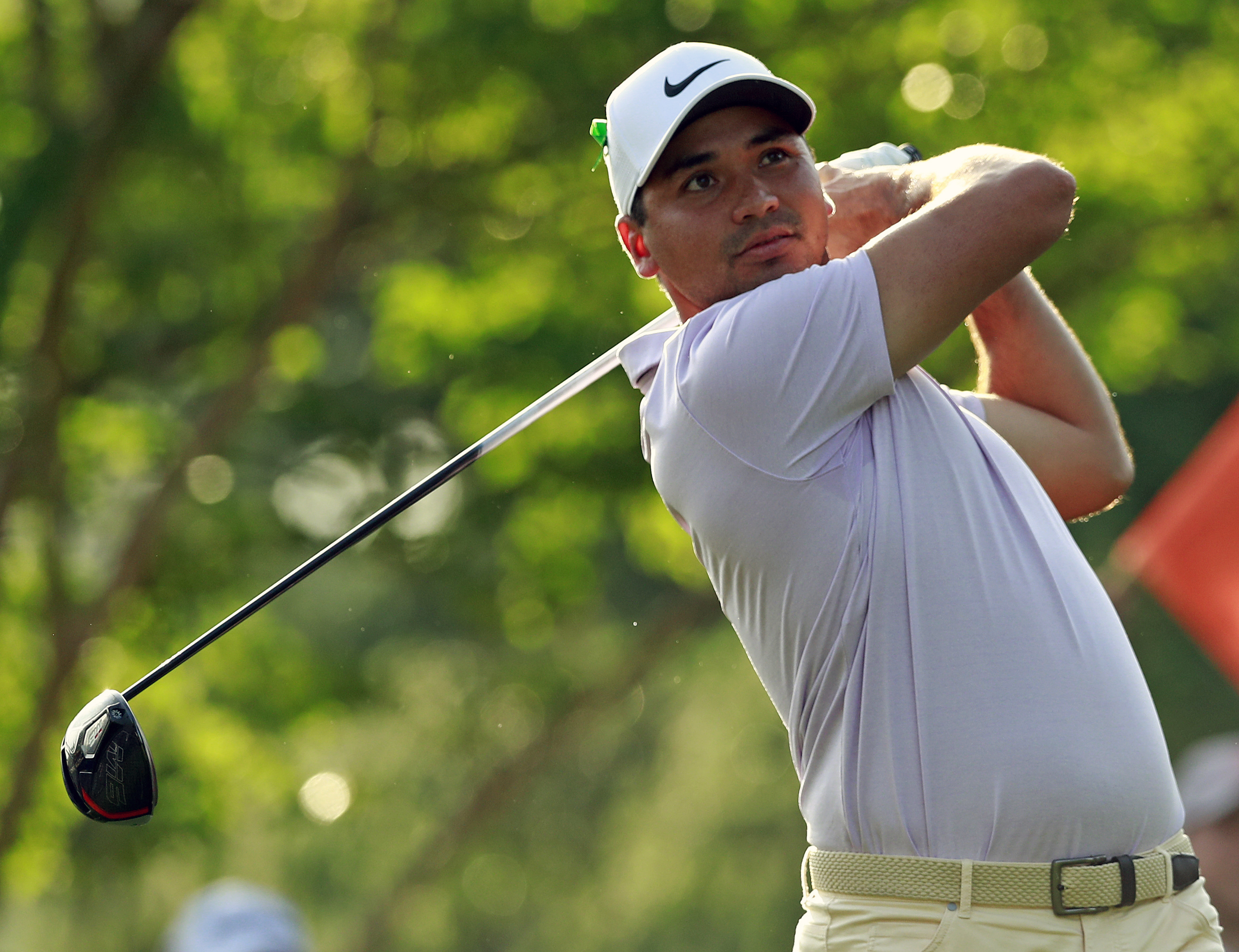 PGA golfers remember shooting victims with green ribbons