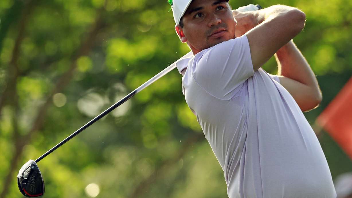 PGA golfers remember shooting victims with green ribbons
