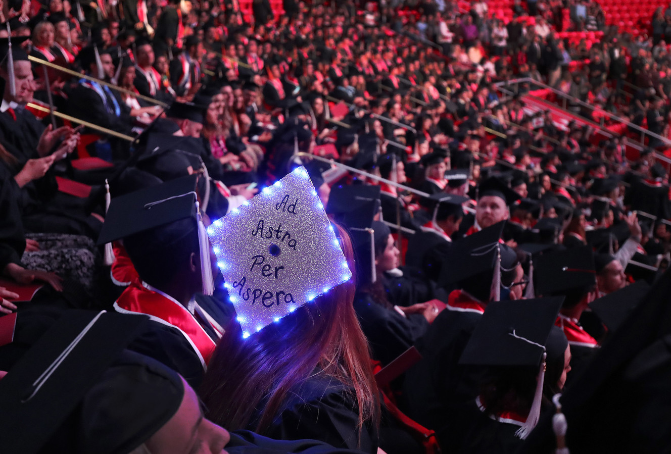 Graduate Savannah Bowden wears a light-up hat during the University of Utah commencement in Salt Lake City on Thursday, May 2, 2019. (Photo: Jeffrey D. Allred, KSL)