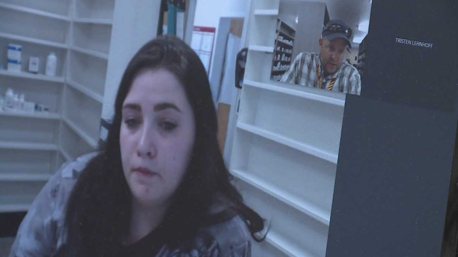 Smith talking with a pharmacy technician in Green River Wednesday, May 1, 2019. Photo: Jay Dortzbach, KSL TV