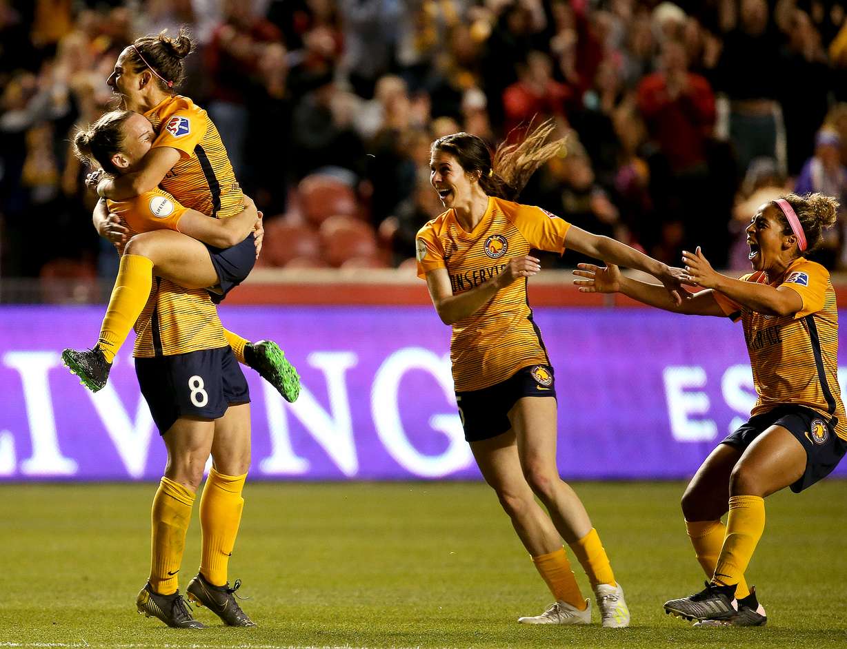 Utah Royals FC forward Amy Rodriguez (8) is congratulated by teammates Vero Boquete, Erika Tymrak and Desiree Scott after scoring against Chicago at Rio Tinto Stadium in Sandy on Friday, May 3, 2019. (Photo: Laura Seitz, KSL)