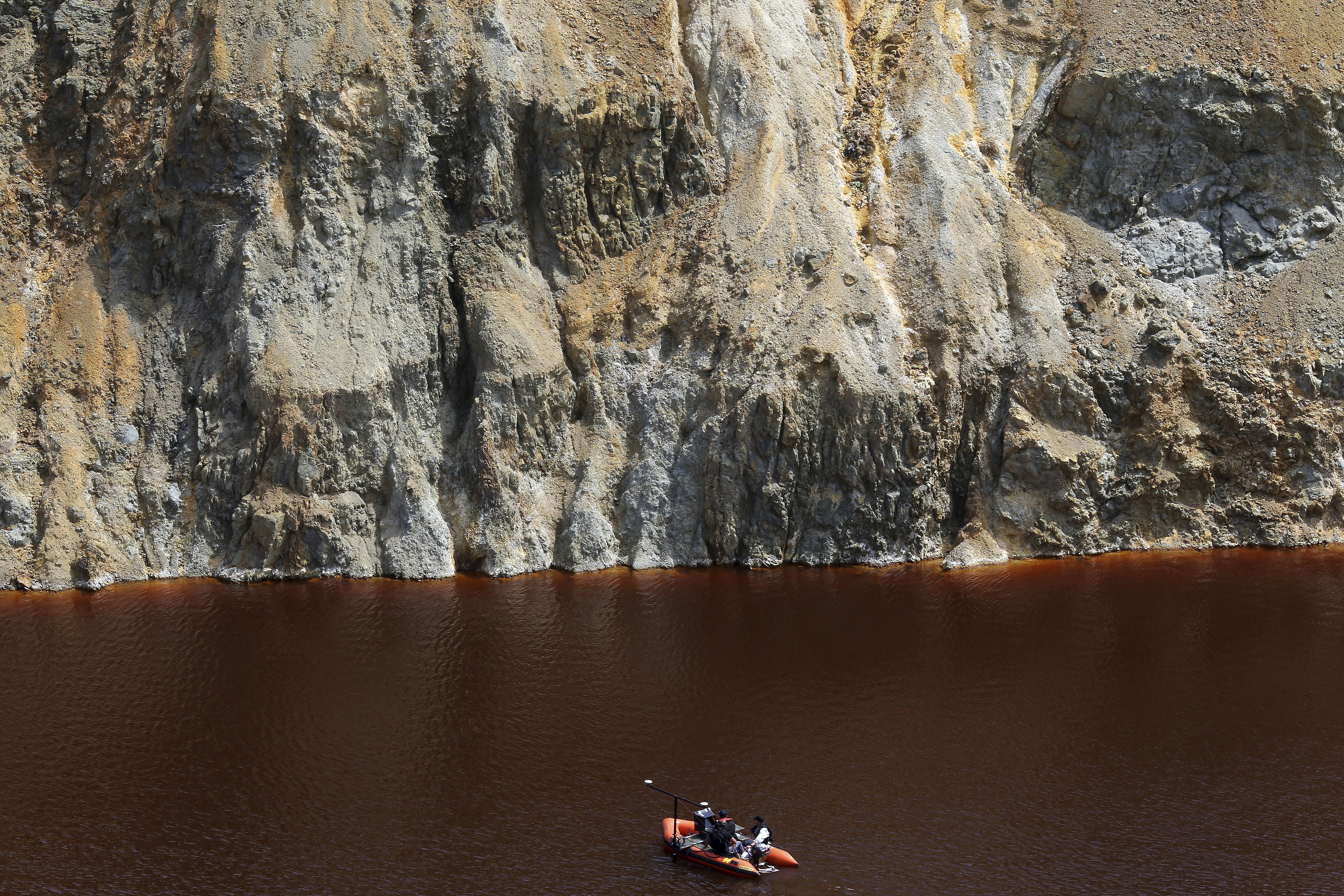 The Latest: 2nd suitcase with remains found in Cyprus lake