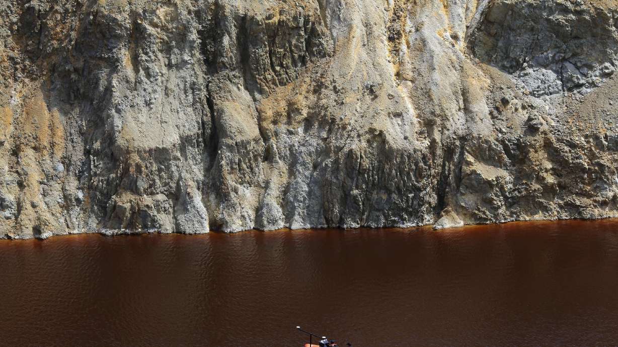 The Latest: 2nd suitcase with remains found in Cyprus lake