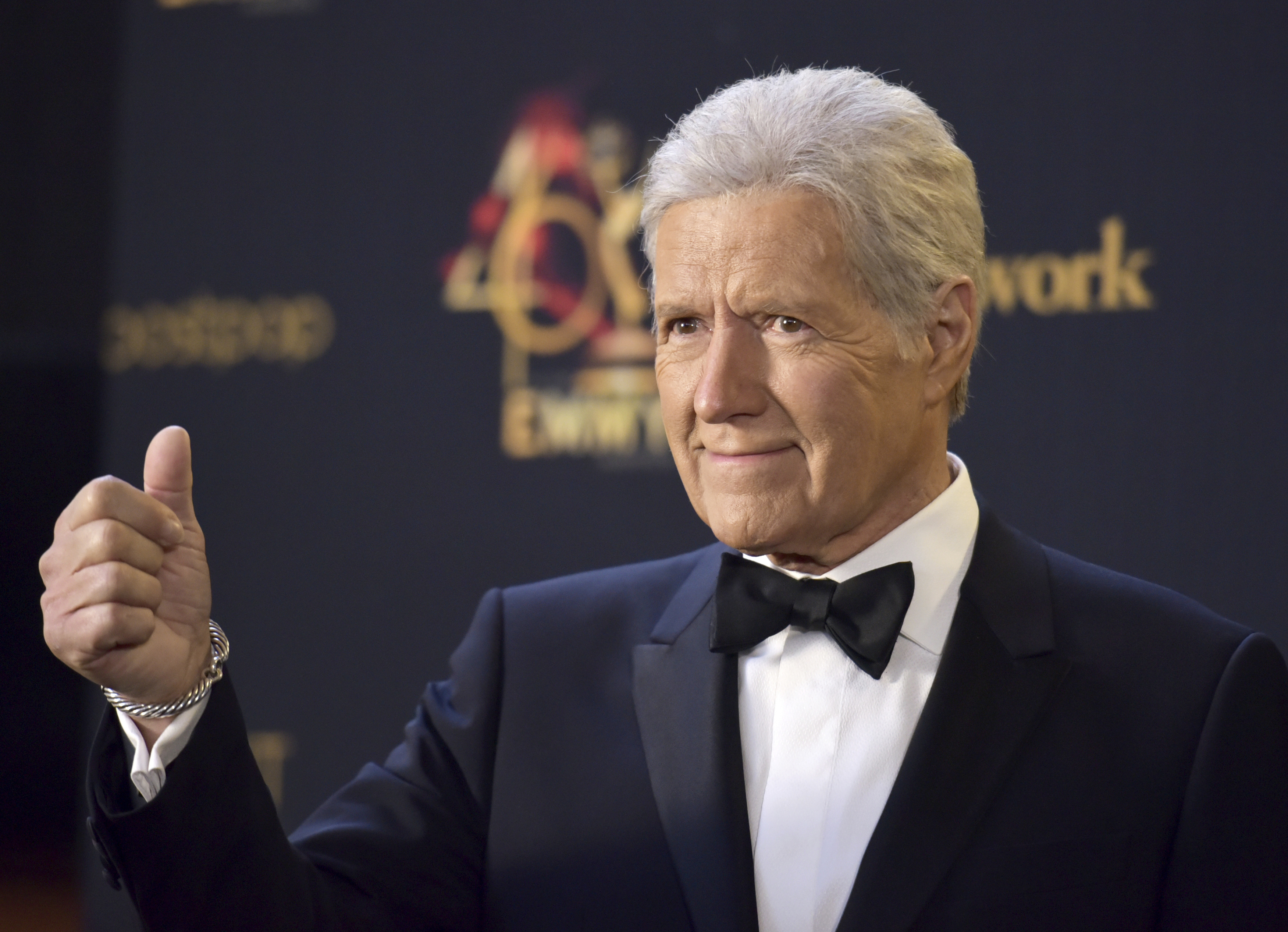 "Jeopardy!" host Alex Trebek's Emmy Award comes with ovation