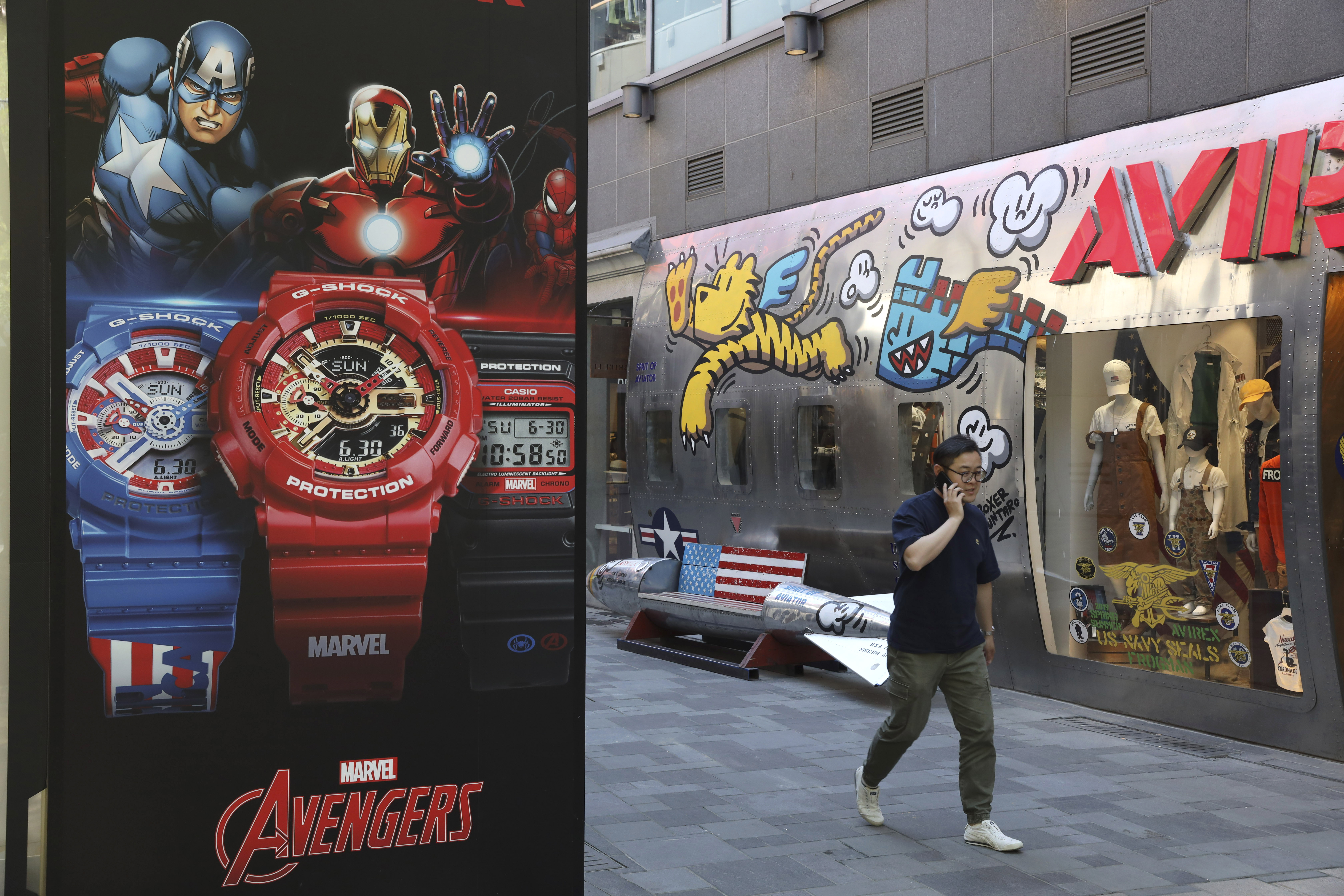 The Latest: Shares dive as Trump tweets rattle investors