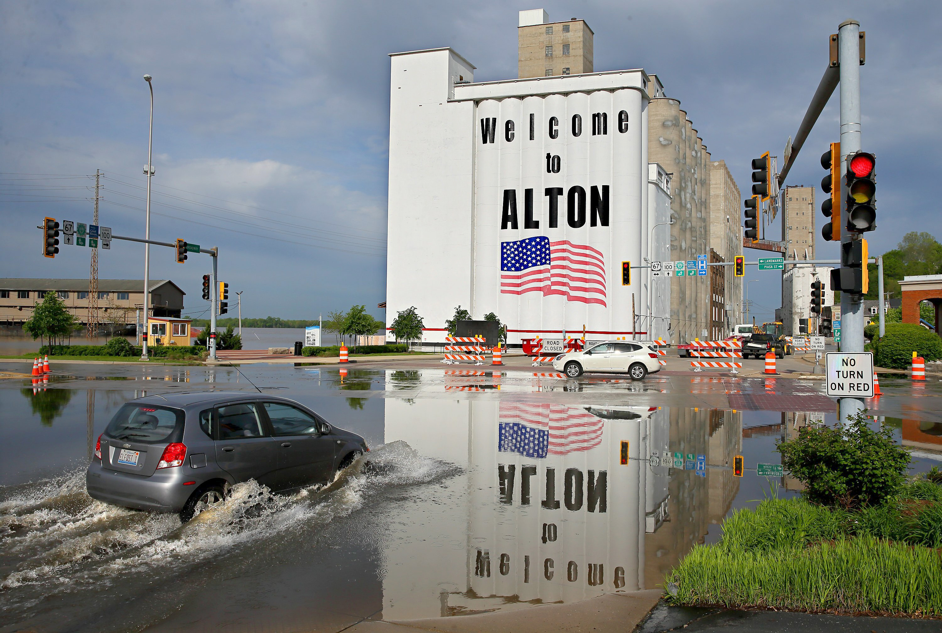 The Latest: Dark clouds on horizon for flood-weary Midwest