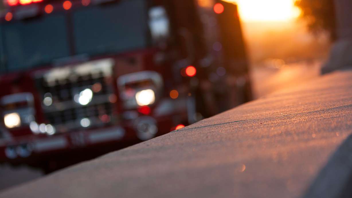 One person died after a camping trailer burst into flames Monday morning in Carbon County.