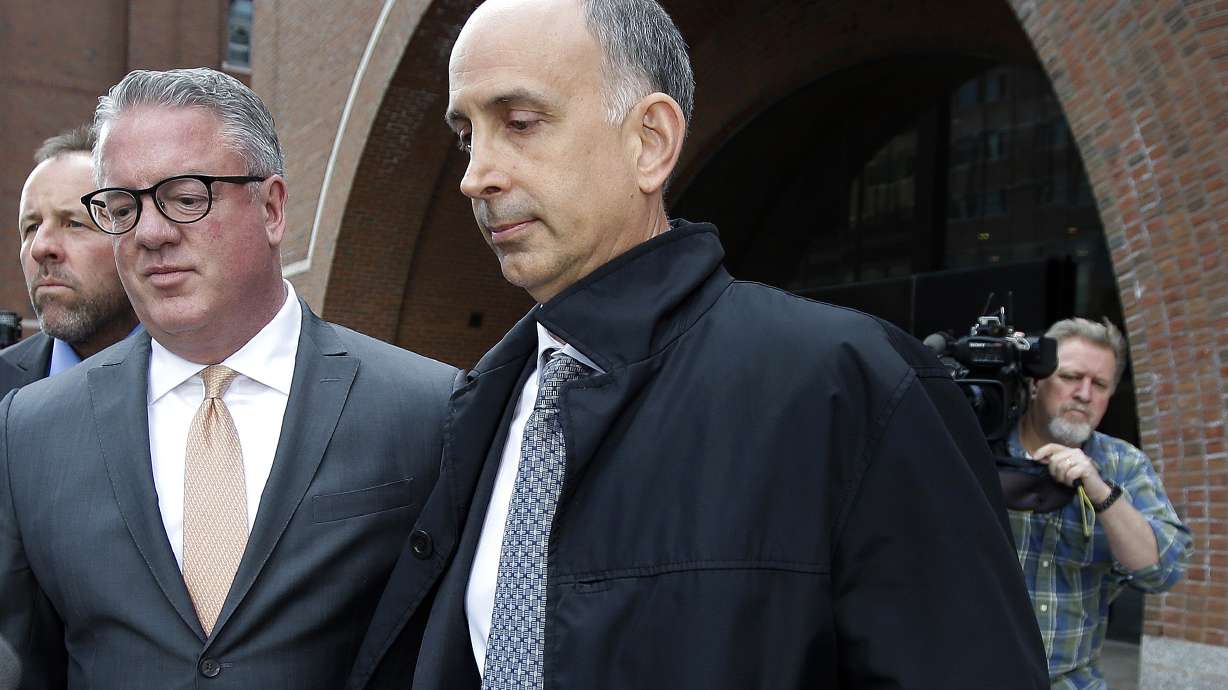 A 3rd parent pleads guilty in college admissions scheme