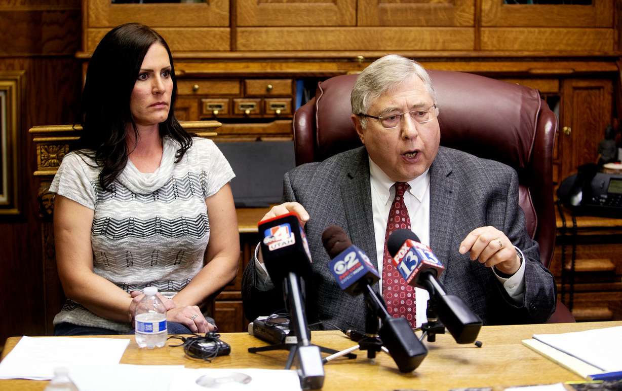 Brenda Mayes, left, listens to her attorney, Robert Sykes, during a press conference at Sykes office in Salt Lake City on Tuesday, May 7, 2019. A civil rights lawsuit filed in U.S. District Court says a Davis School District bus driver "was driven by racial animus to commit assaults and acts of bullying on mixed-race students assigned to his bus route." (Photo: Scott G Winterton, KSL)
