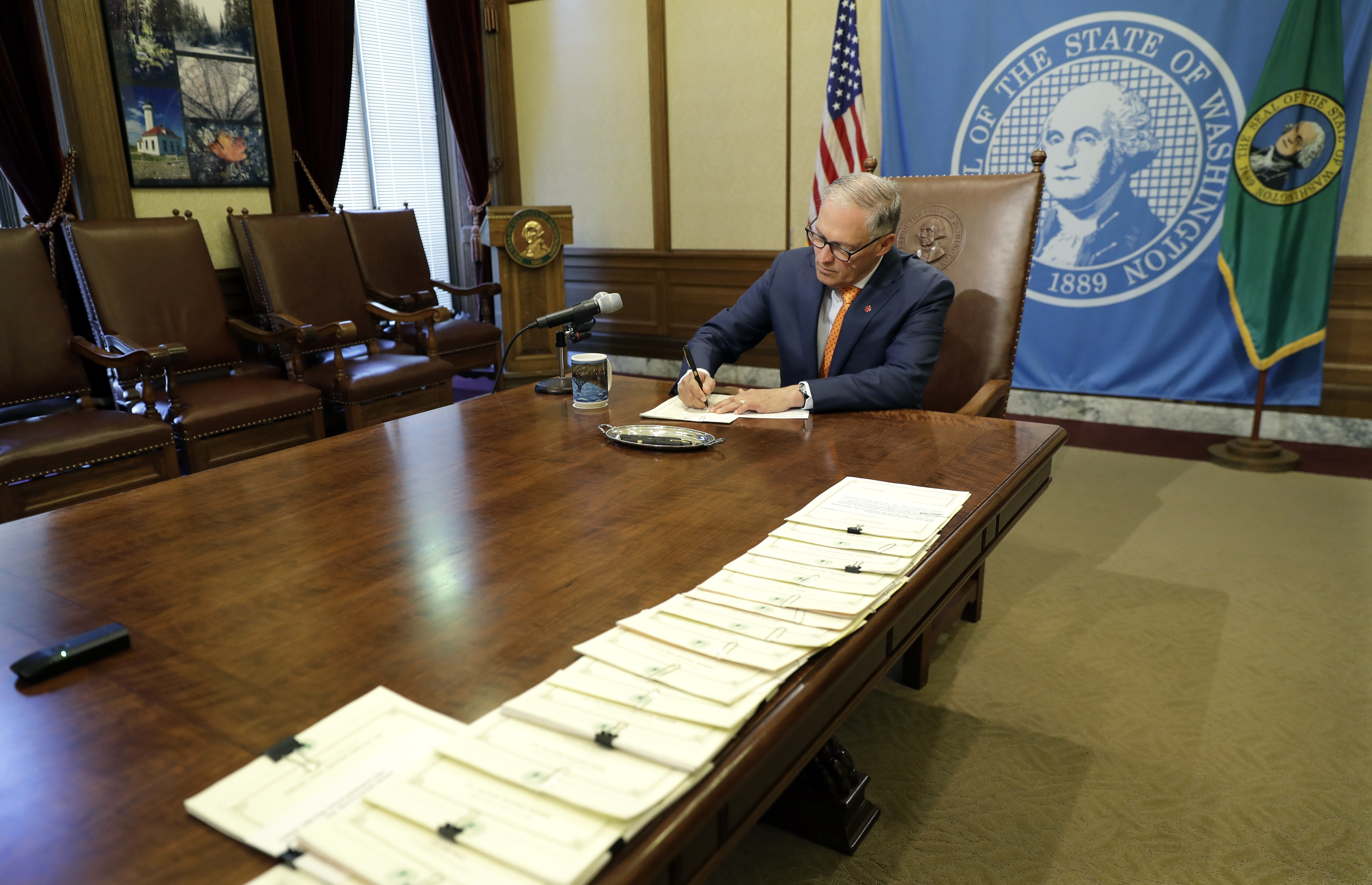 Washington state governor signs bills tightening gun rules