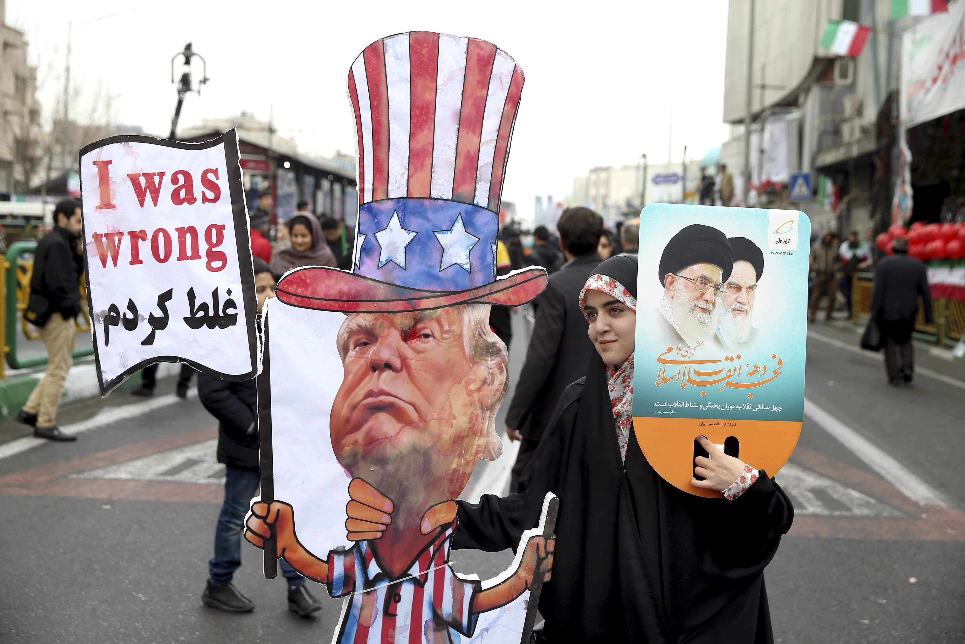The Latest: Pompeo says US will wait to see what Iran does