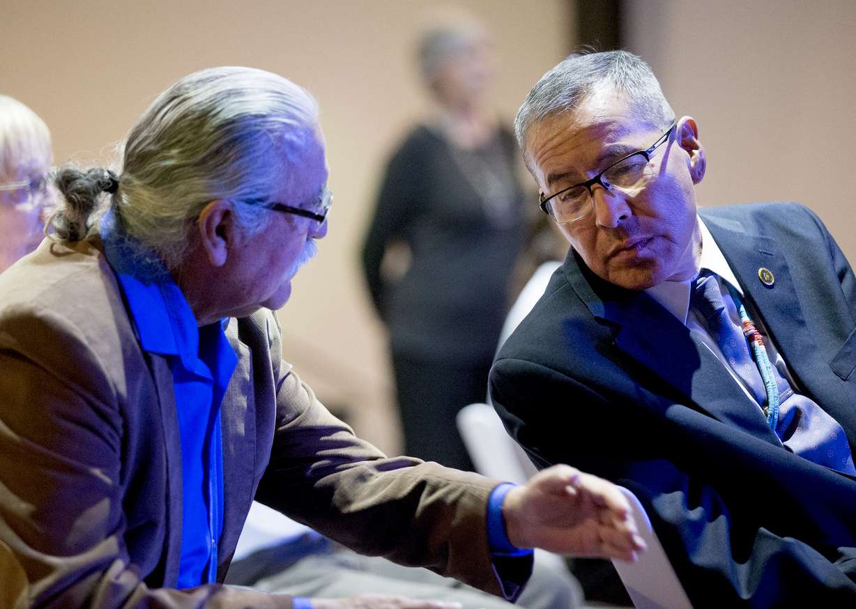 San Juan County Commissioners Willie Grayeyes, left, and Kenneth Maryboy, right, are seen at an event in Salt Lake City on Sept. 20, 2018. They were elected to the commission in 2018 after a federal discrimination lawsuit mandated that the county redraw its voter district lines. A proposition that seeks to initiate a government change in the county is the latest drama in a fight over elections and voting rights in the majority-Navajo southeast Utah county. (Photo: Rick Bowmer, AP)