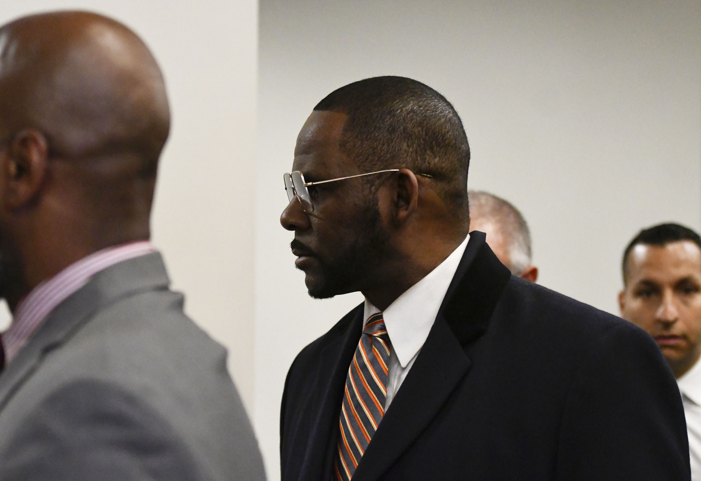 The Latest: R. Kelly pays $62,000 in back child support
