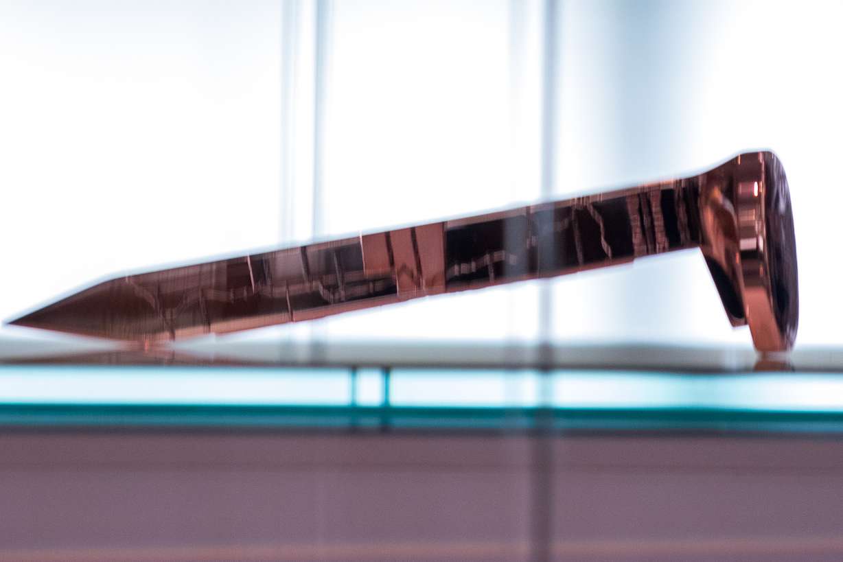 An image of the Utah copper spike during an unveiling event at O.C. Tanner Jewelry in Salt Lake City on Wednesday, May 8, 2019. Gov. Gary Herbert signed a bill to designate the spike as Utah's official spike for the transcontinental railroad. (Photo: Carter Williams, KSL.com)