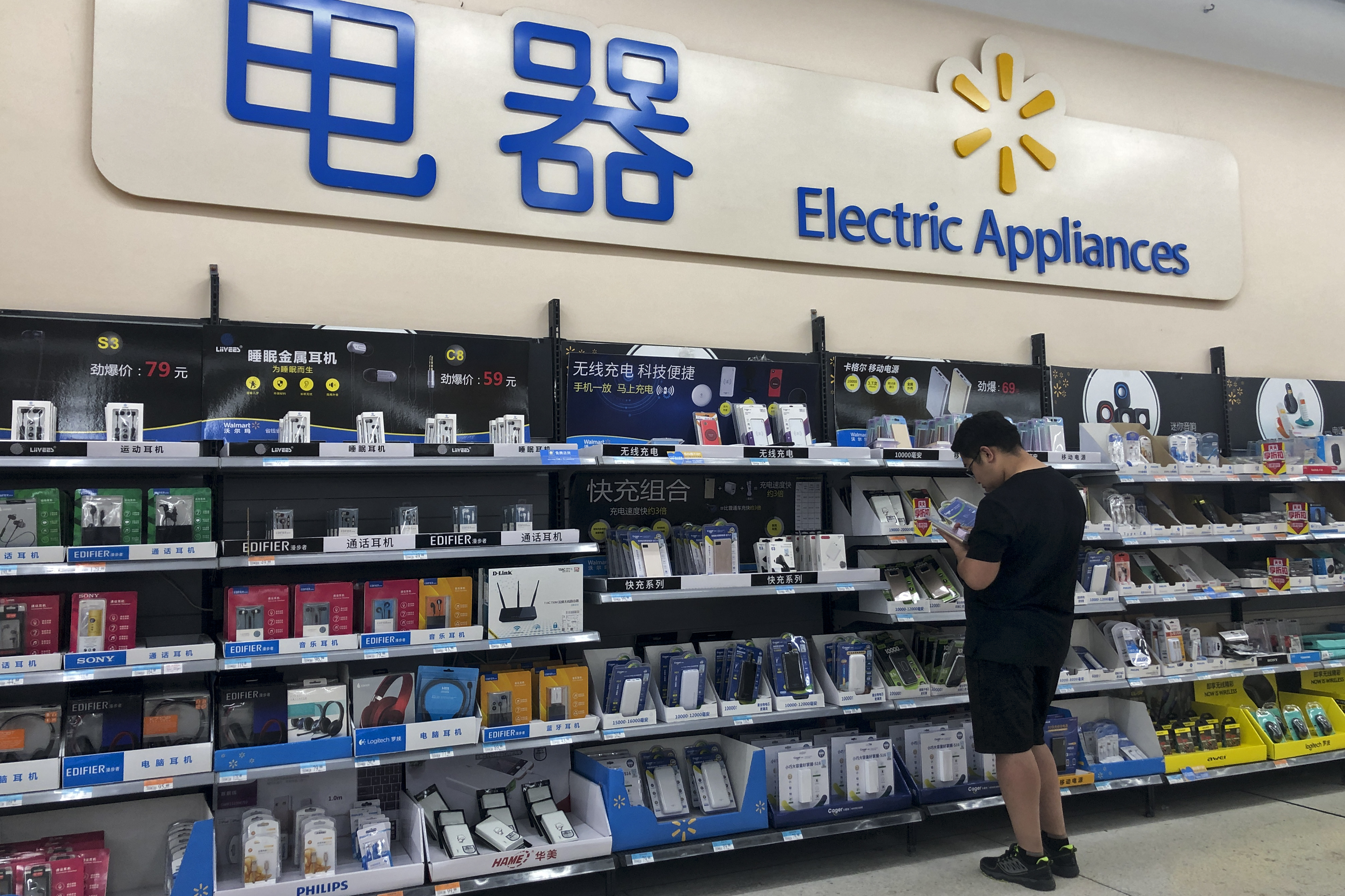 Chinese companies brace for tariff hike as trade talks begin