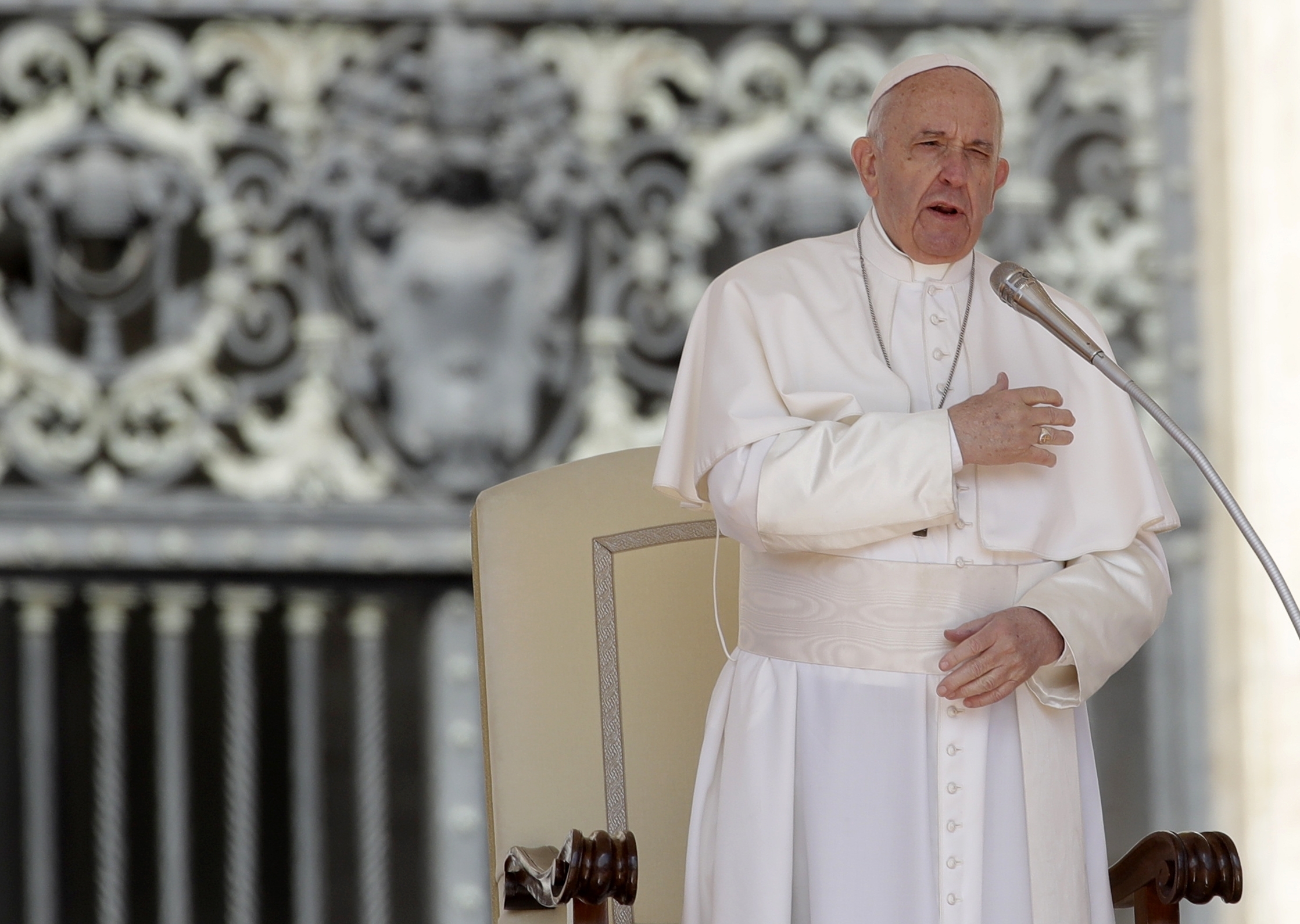 The Latest: Pope makes reporting child sex crimes mandatory