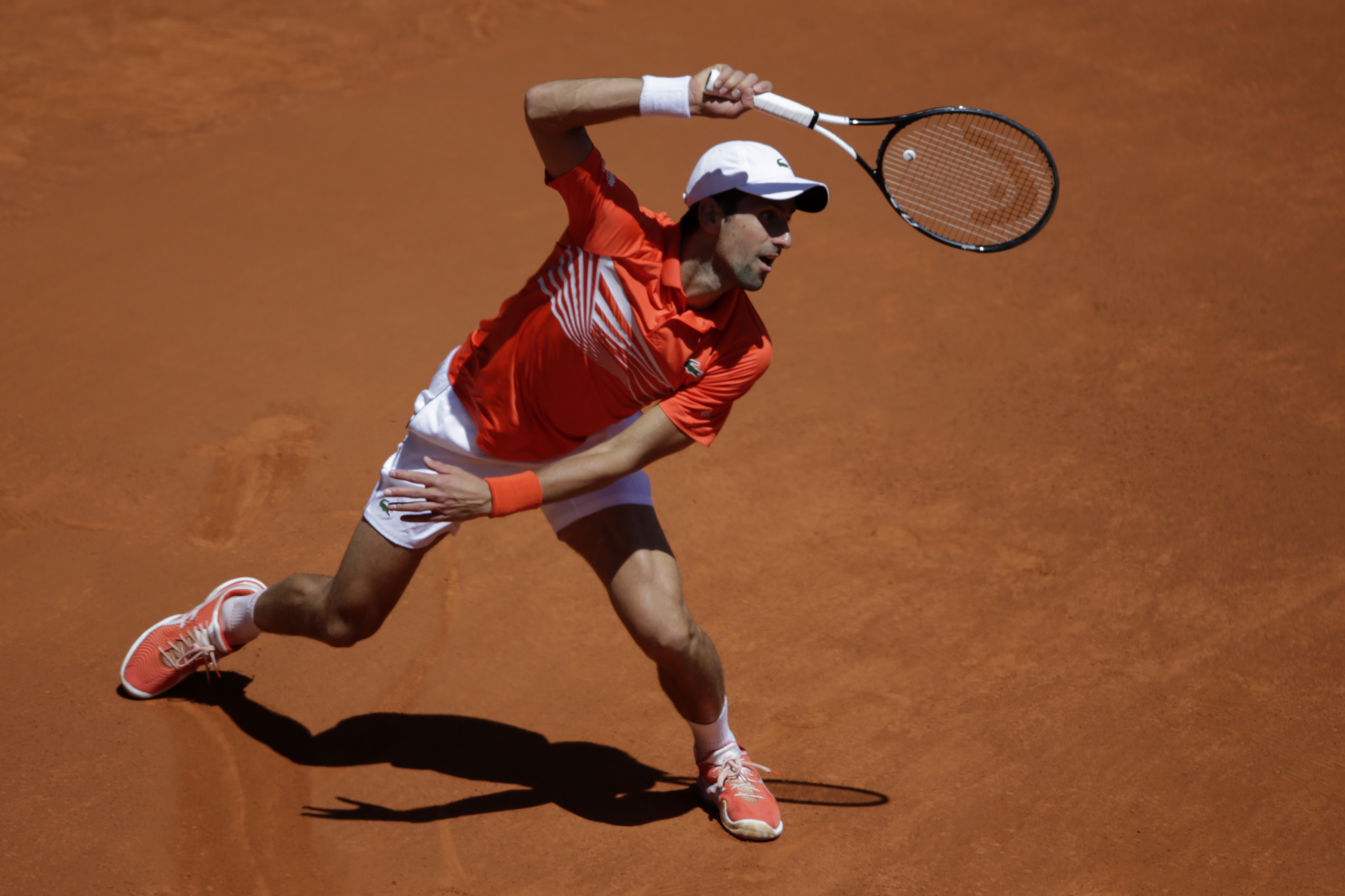 Federer outlasts Monfils to reach Madrid Open quarterfinals