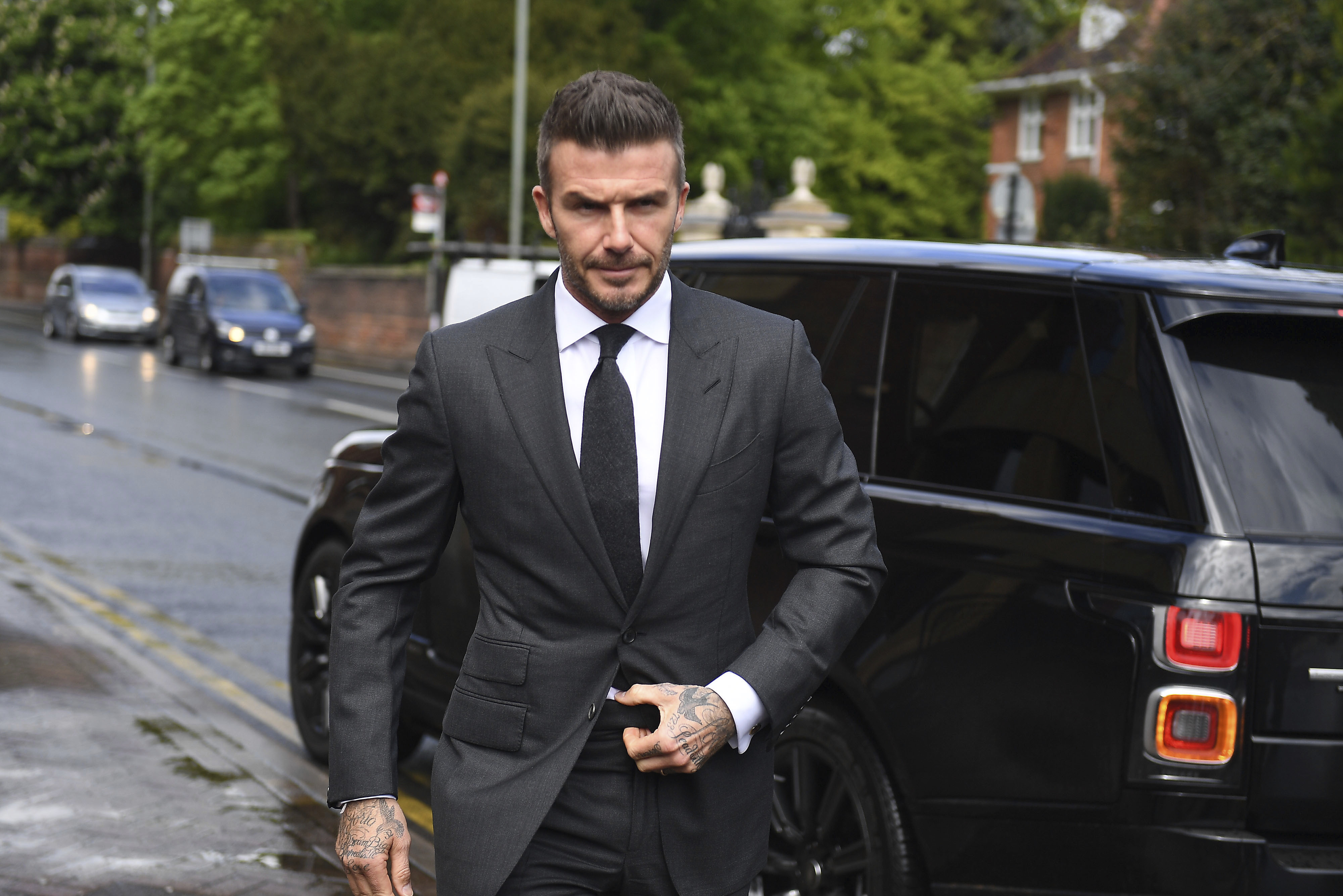 Ban it like Beckham: Phone costs soccer star right to drive