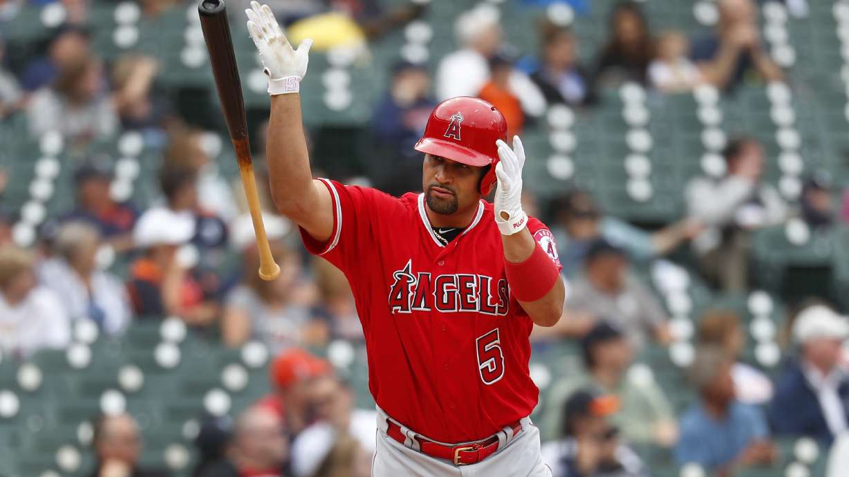 Pujols reaches 2,000 RBIs, joins Aaron and Rodriguez