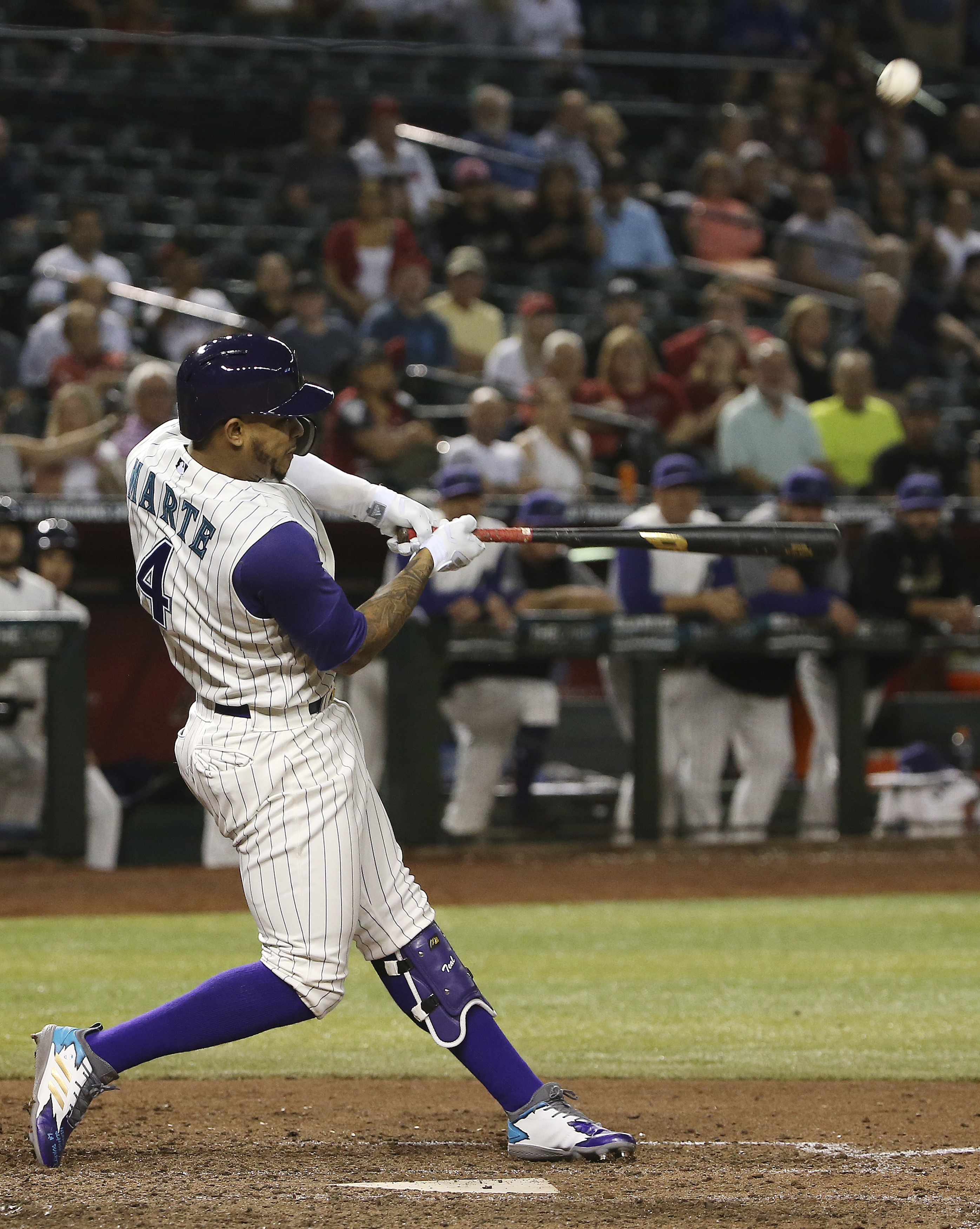 Peralta, Marte lift Diamondbacks over Braves 3-2 in 10