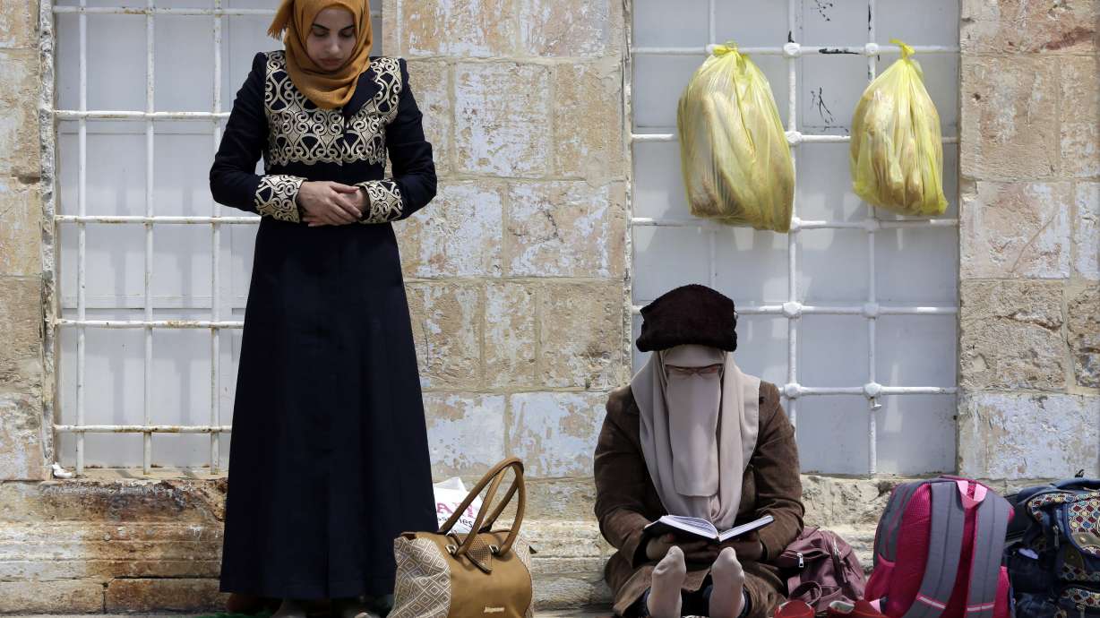 Muslims gather in Jerusalem for first Ramadan Friday prayers