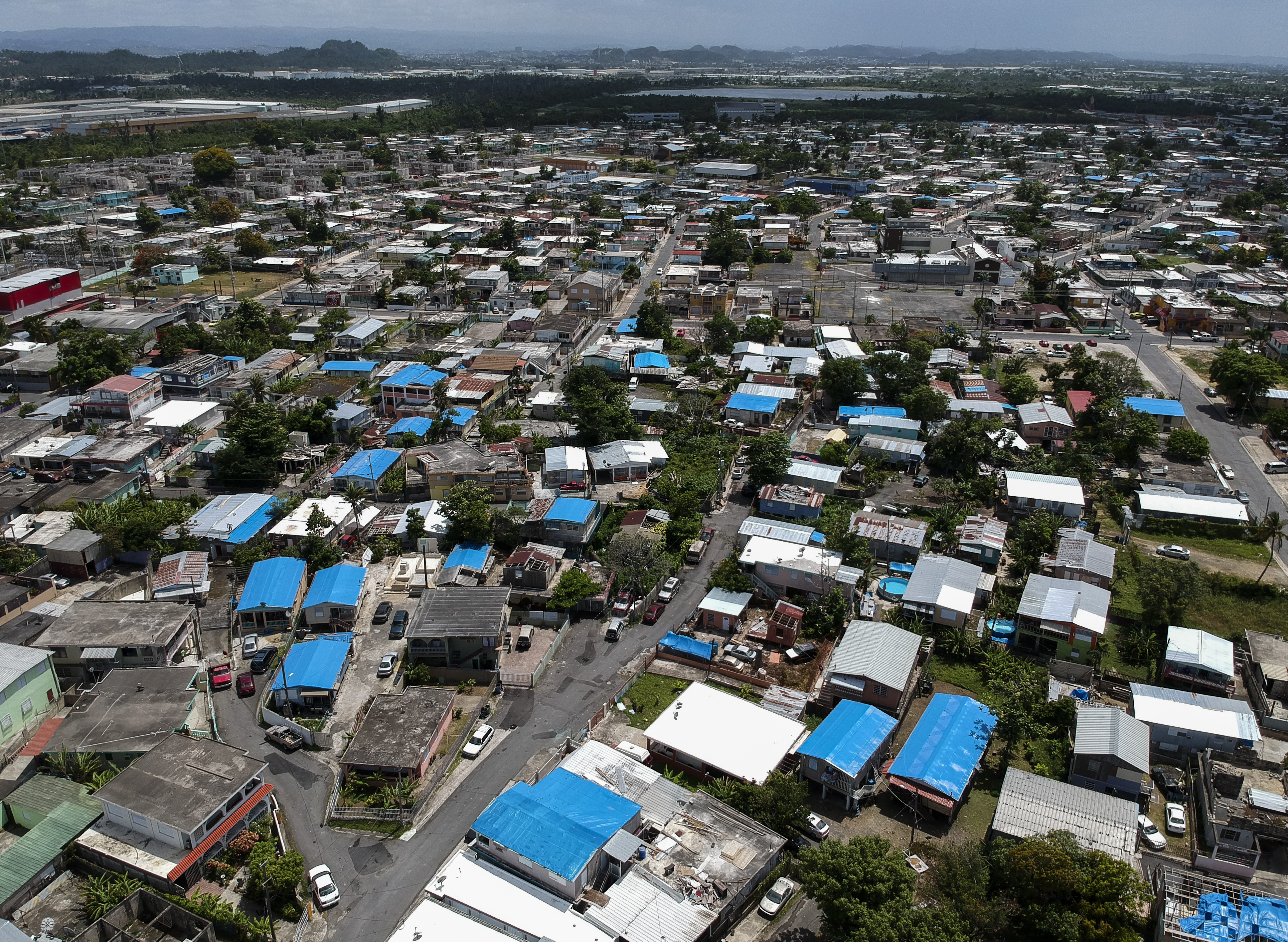 This June 18, 2018, file photo shows an aerial view of the Amelia neighborhood in the municipality of Catano, east of San Juan, Puerto Rico. (Photo: Dennis M. Rivera, AP Photo.)