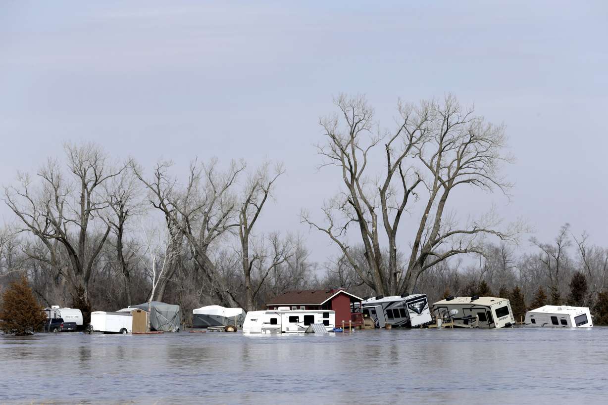 Flooded RV's, washed away by the flood waters of the Platte River, are seen in Merritt's RV Park in Plattsmouth, Neb., Sunday, March 17, 2019. Hundreds of people remained out of their homes in Nebraska, but rivers there were starting to recede. (Photo: Nati Harnik, AP Photo.)