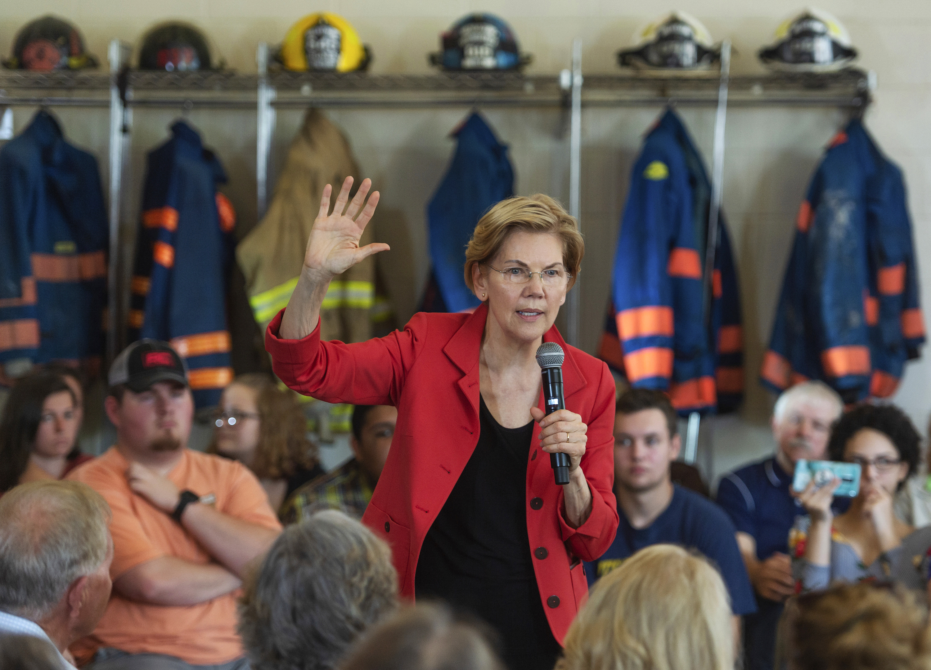 The Latest: Warren wants politics out of addiction tax plan