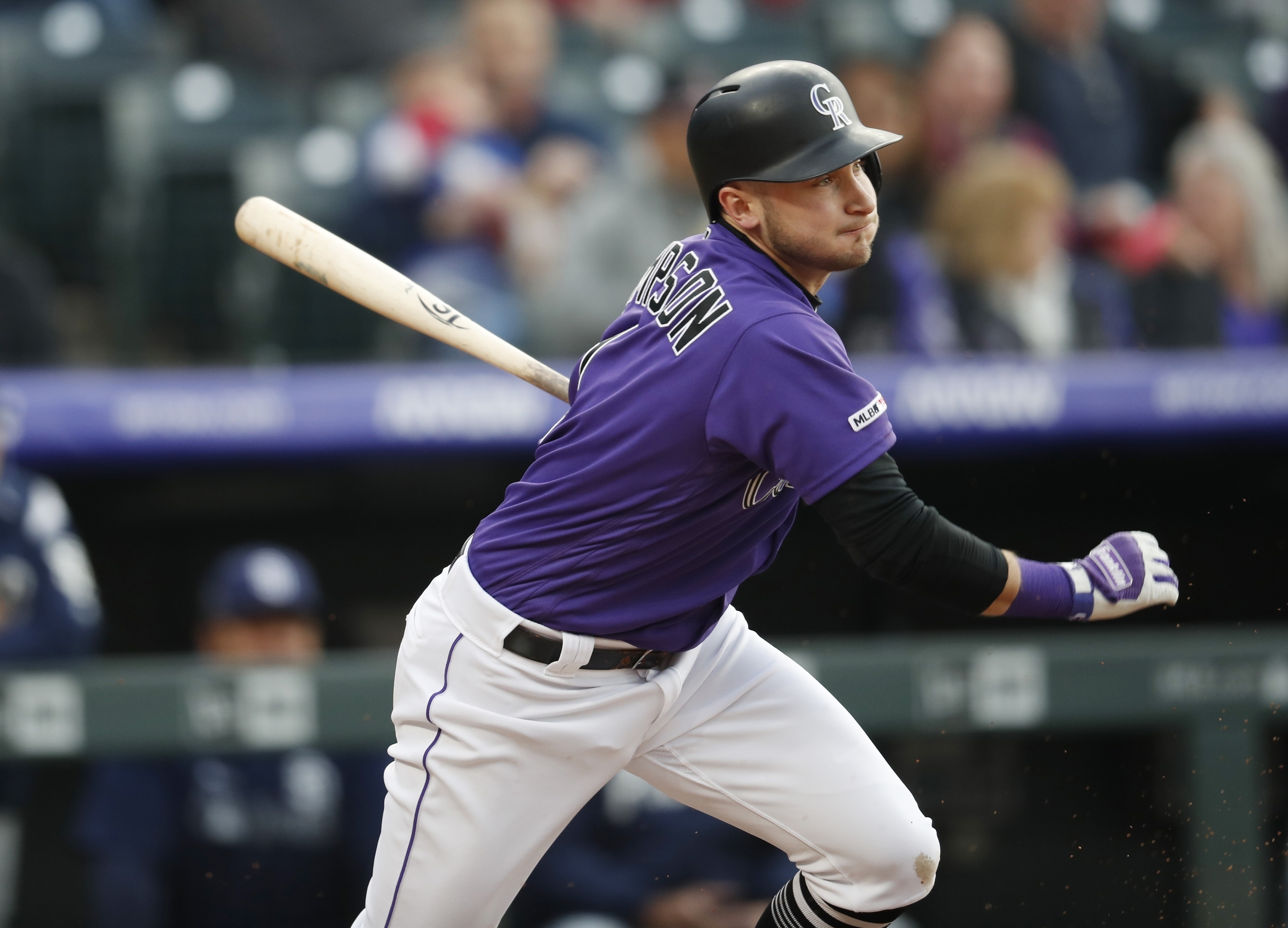 Marquez's arm, bat lead Rockies past Padres 12-2