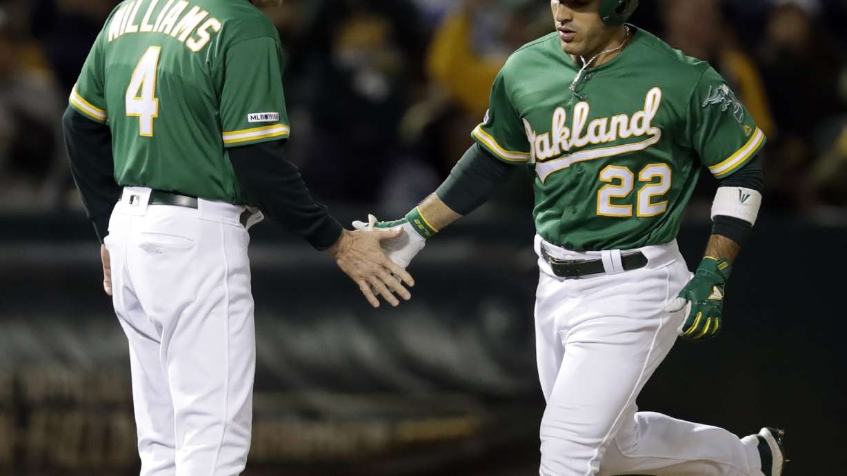 Chapman homers vs Hand in 12th to lift A's over Indians 4-3