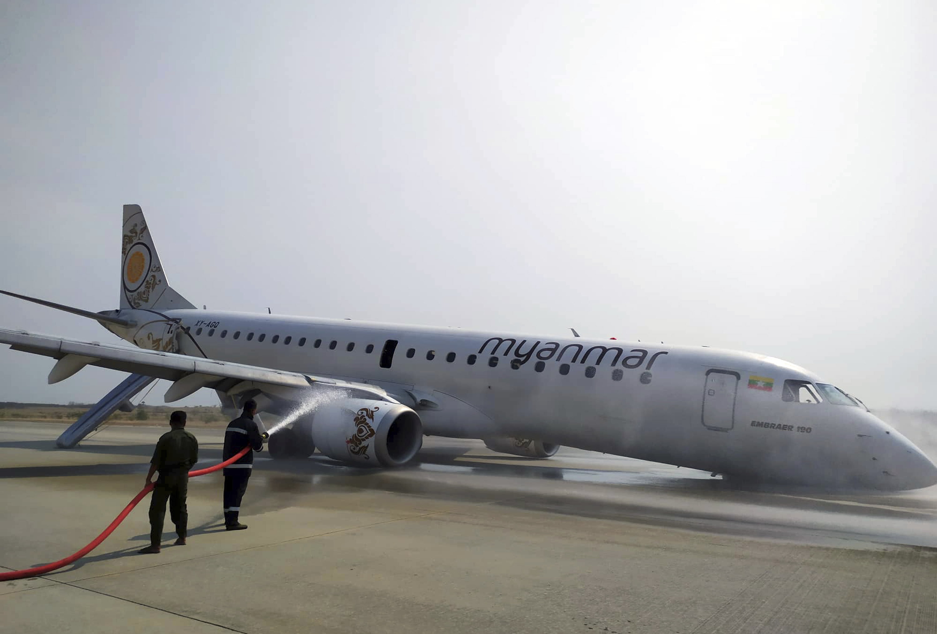 Myanmar passenger jet lands safely after landing gear fails