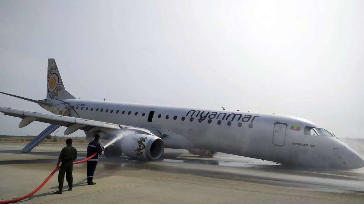 Myanmar passenger jet lands safely after landing gear fails