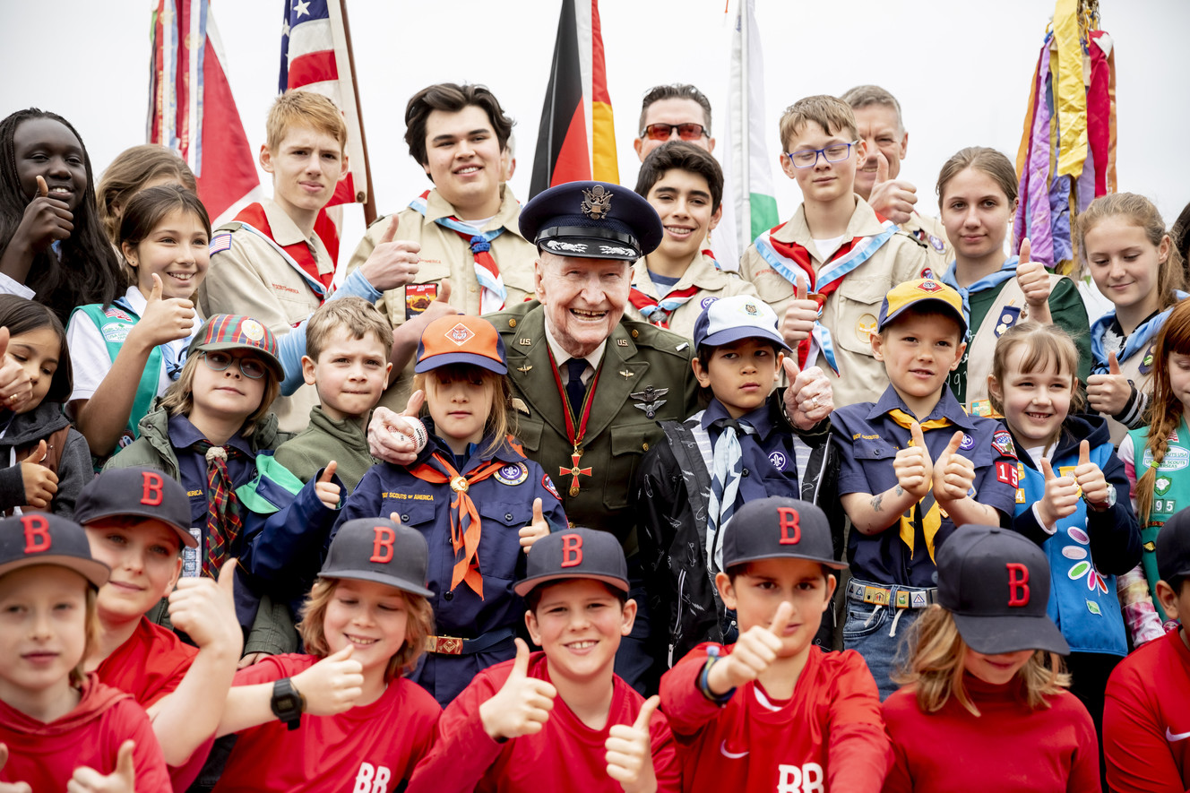 Retired Col. Gail Halvorsen, center, poses with boys and girls as he attends a ceremony to dedicate the baseball and softball field of the Berlin Braves baseball team in 'Gail Halvorsen Park' in Berlin , Saturday, May 11, 2019. Halvorsen is known as the "Candy Bomber," "Chocolate Pilot," and "Uncle Wiggly Wings," for the small candy-laden parachutes he dropped from his aircraft to children during the Berlin Airlift of 1948-1949. (Photo: Christoph Soeder, DPA)