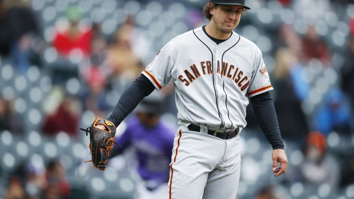 Giants president says lefty Holland's injury wasn't 'fake'