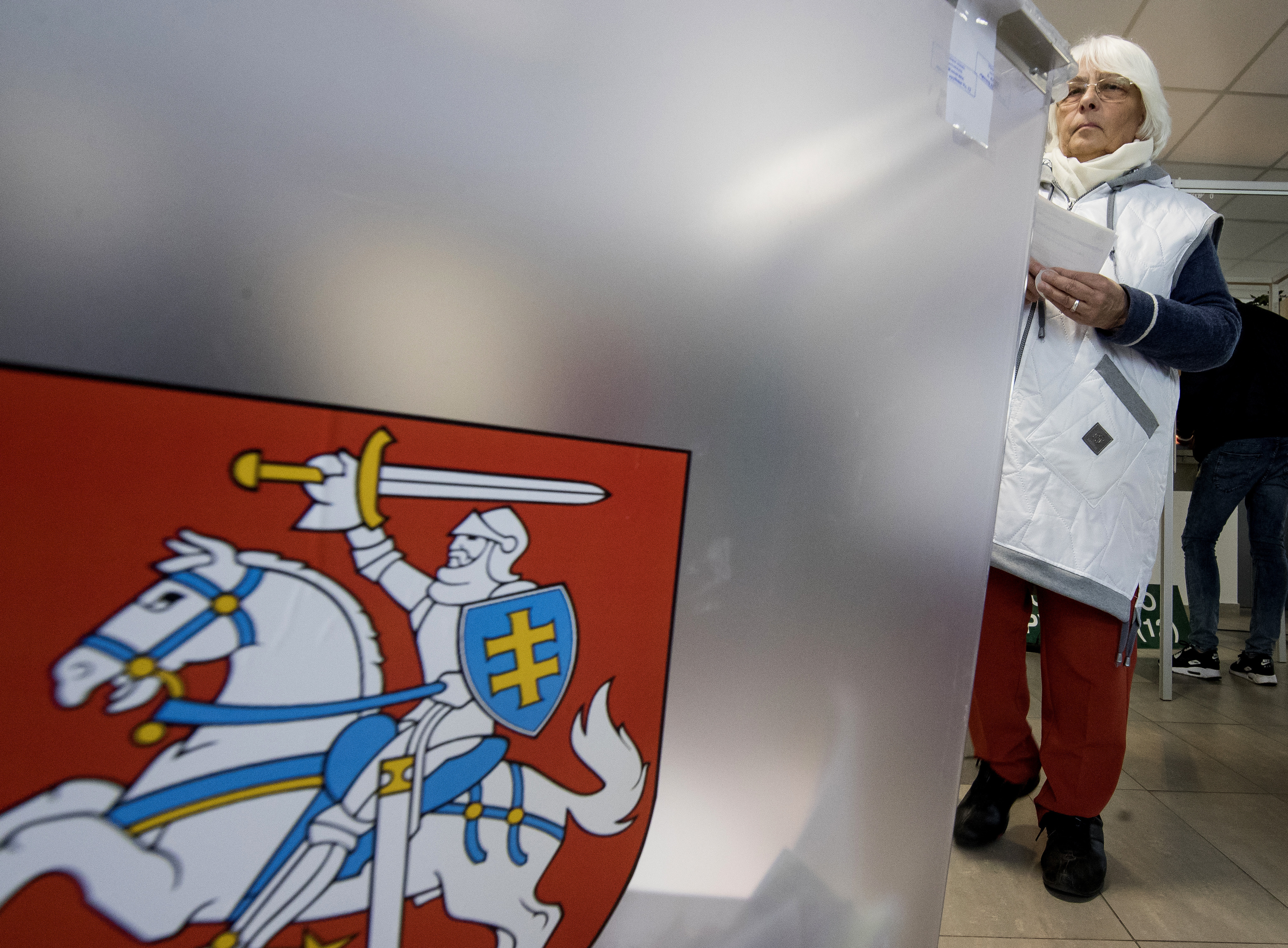 The Latest: Lithuania heads to runoff vote to pick president