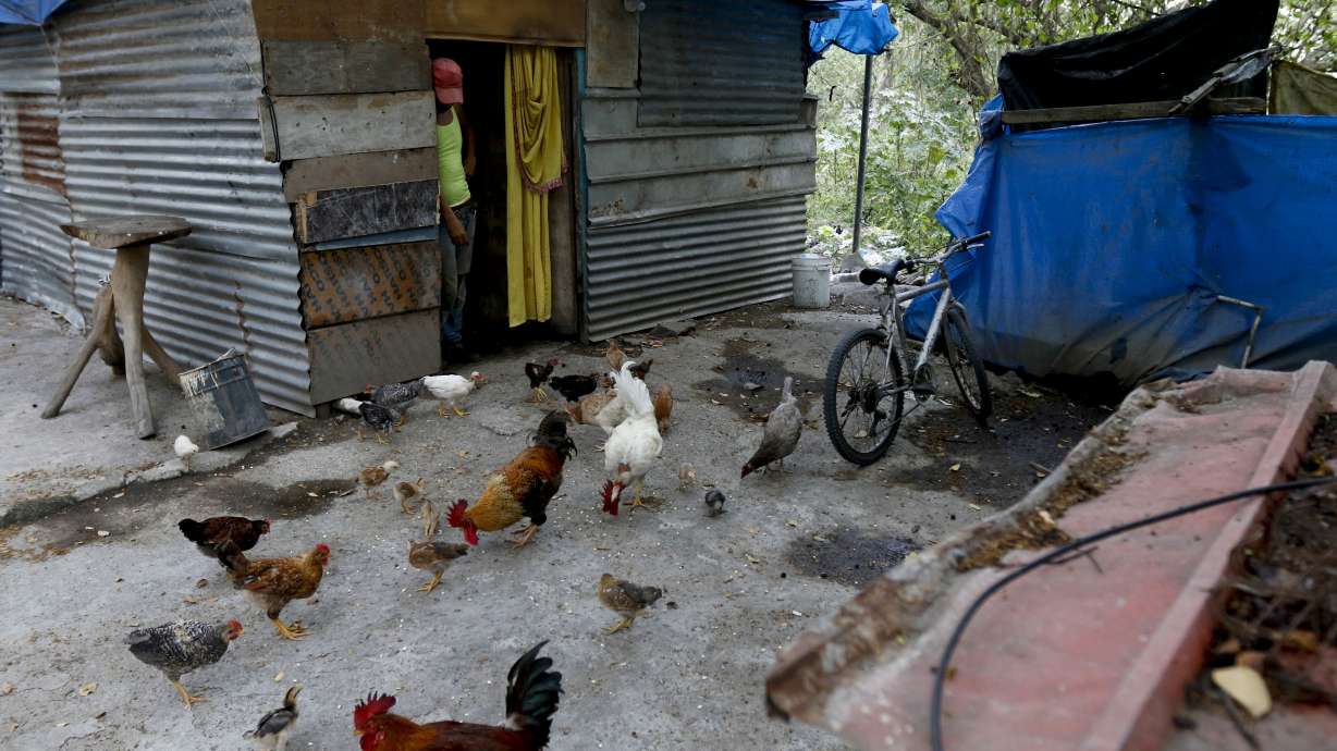 Violence, poverty reign in Honduran city where caravans form